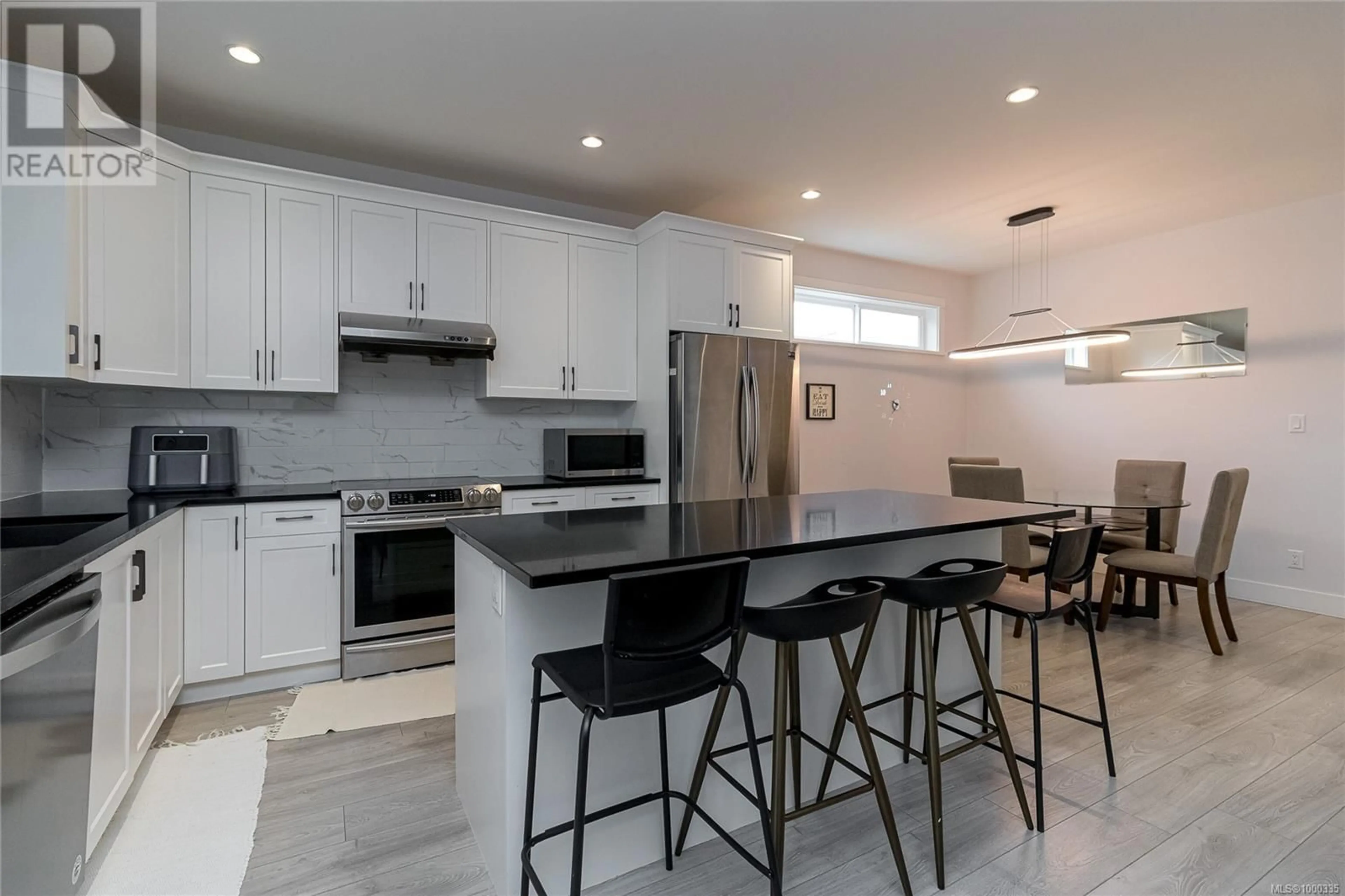 Open concept kitchen, ceramic/tile floor for 3322 MESA PLACE, Langford British Columbia V9C2P3