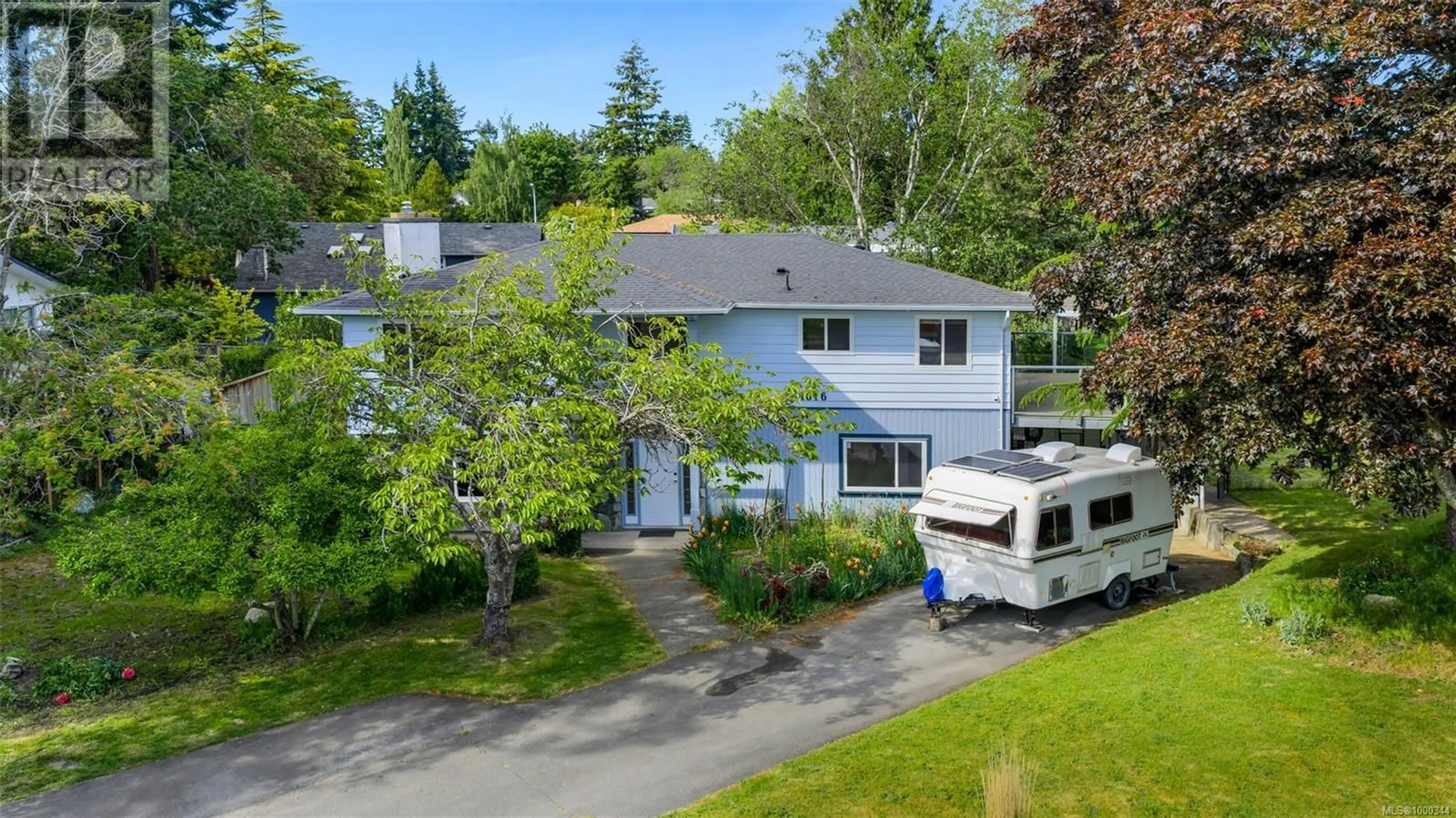 A pic from outside/outdoor area/front of a property/back of a property/a pic from drone, street for 1616 SARITA PLACE, Saanich British Columbia V8N3J4
