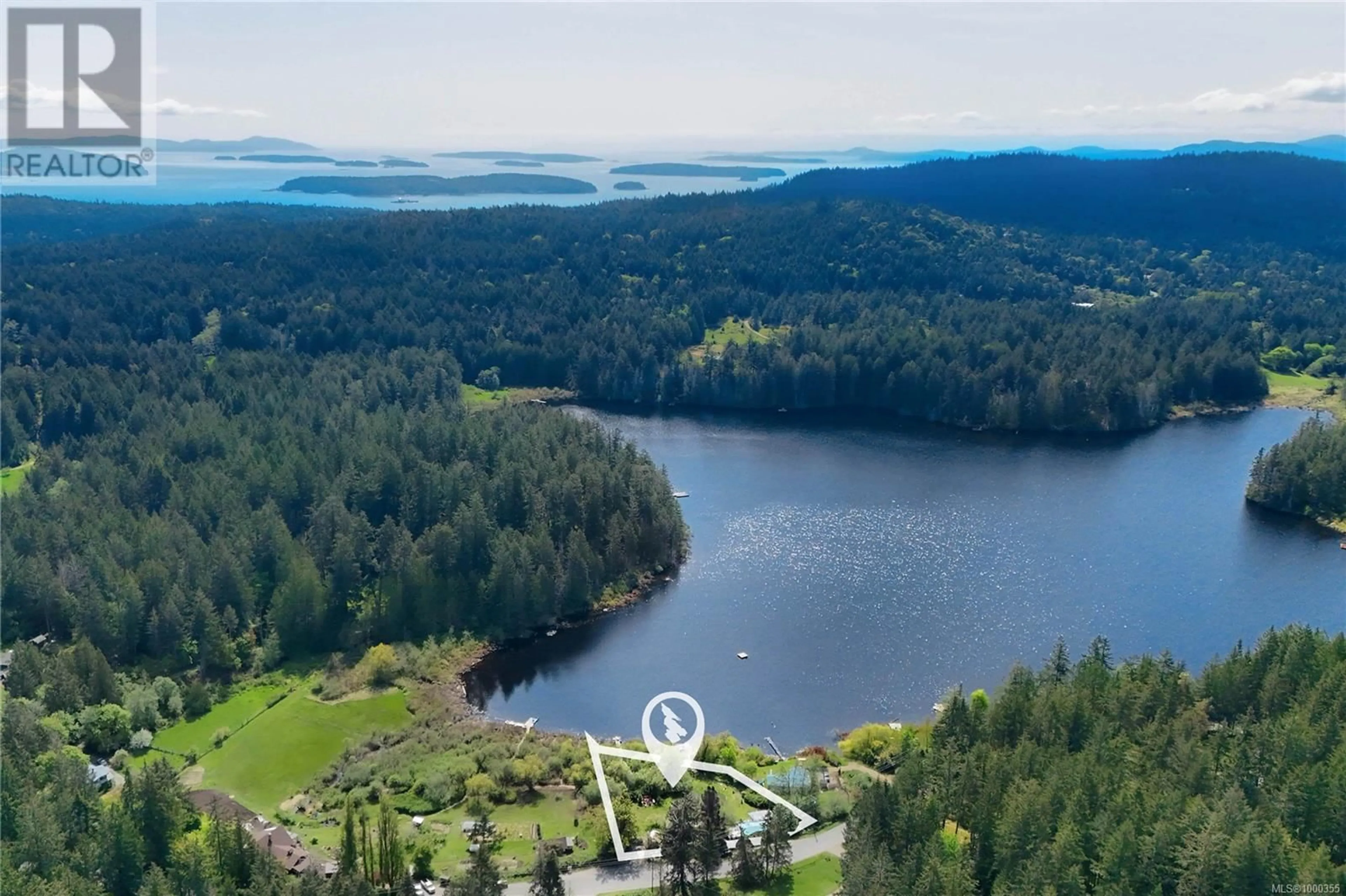 A pic from outside/outdoor area/front of a property/back of a property/a pic from drone, water/lake/river/ocean view for 770 BEAVER POINT ROAD, Salt Spring British Columbia V8K1X9