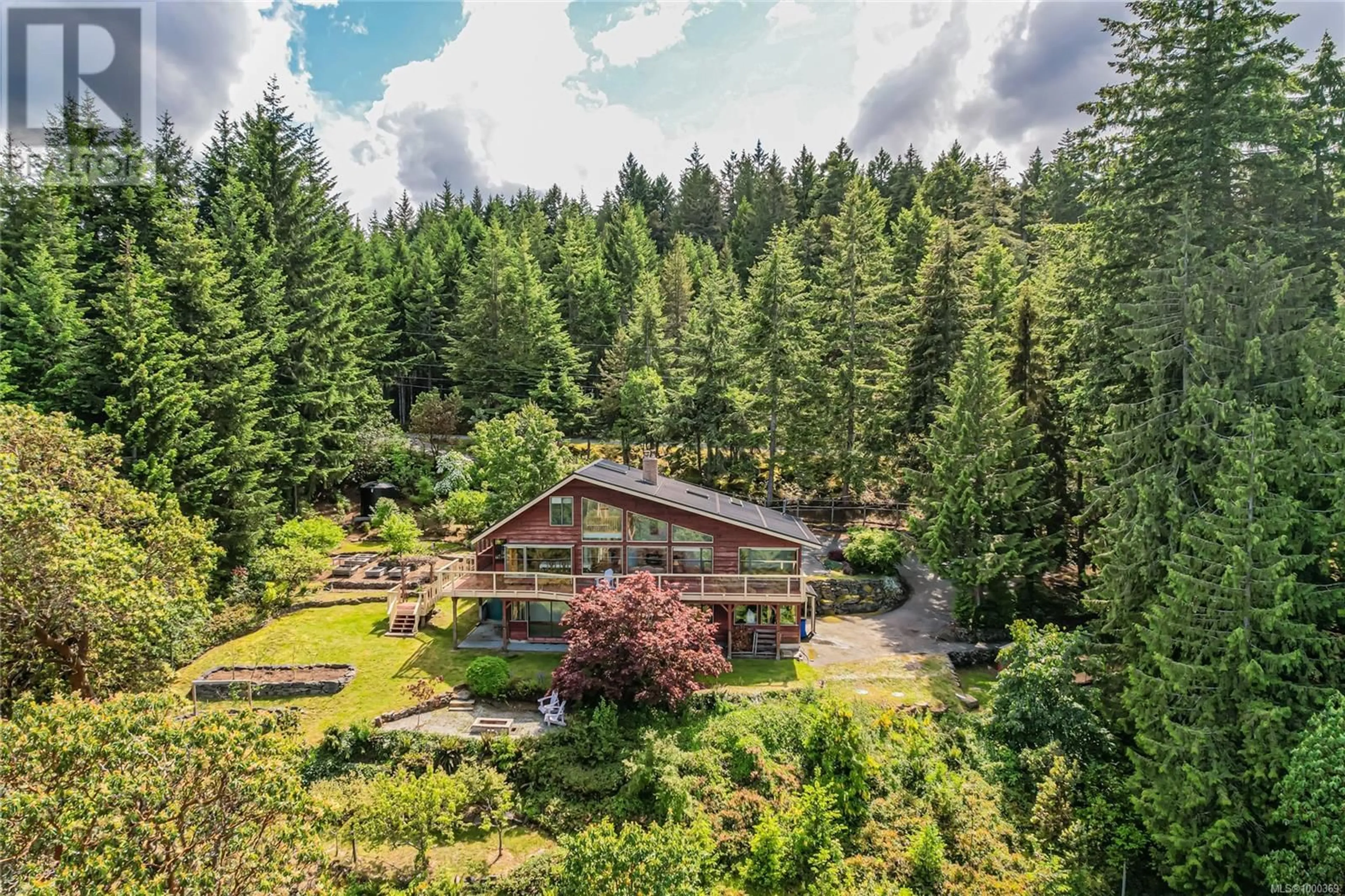 A pic from outside/outdoor area/front of a property/back of a property/a pic from drone, forest/trees view for 200 WILKIE WAY, Salt Spring British Columbia V8K2J4