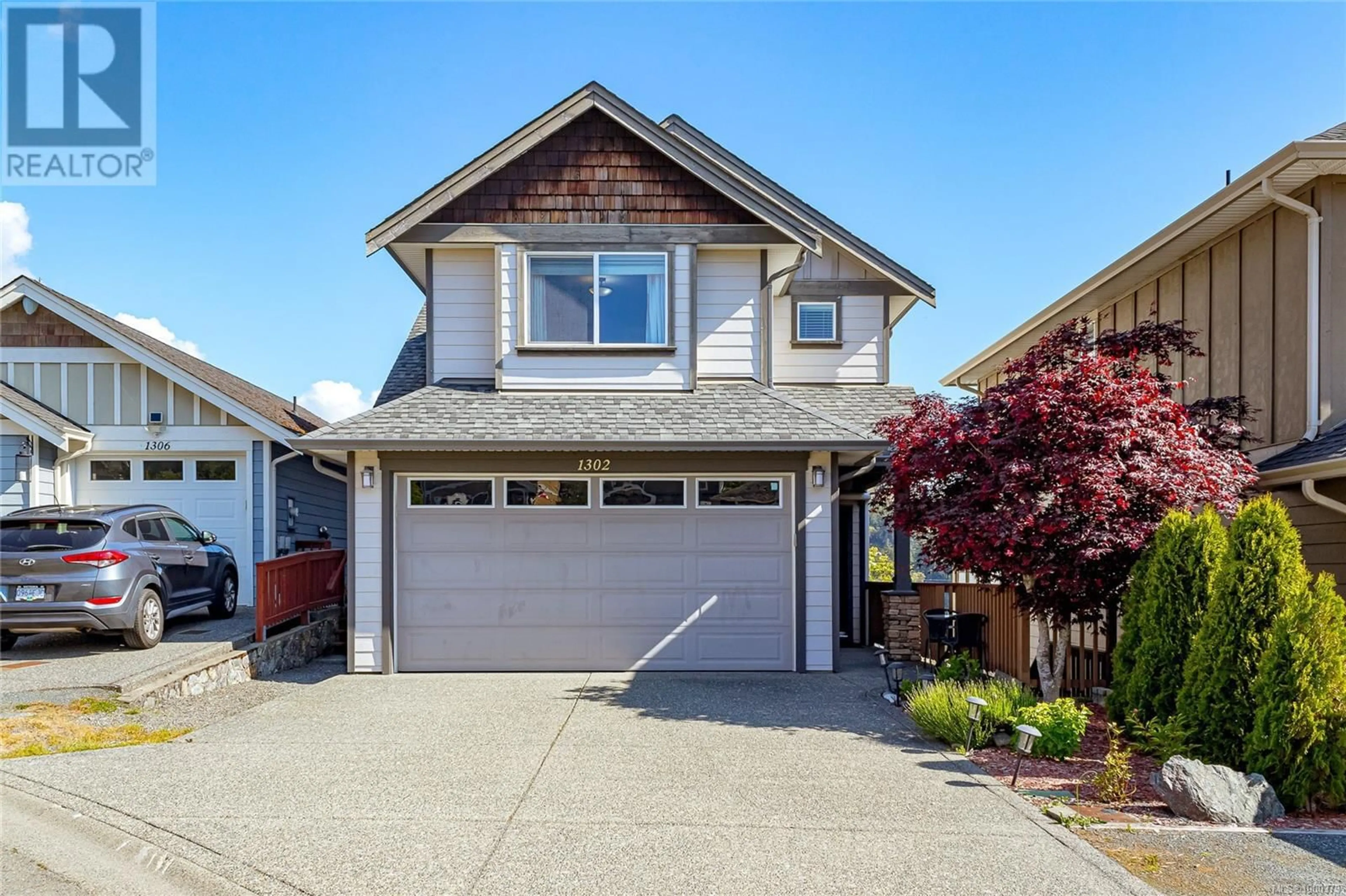 Home with vinyl exterior material, street for 1302 ARTESIAN COURT, Langford British Columbia V9B0L9