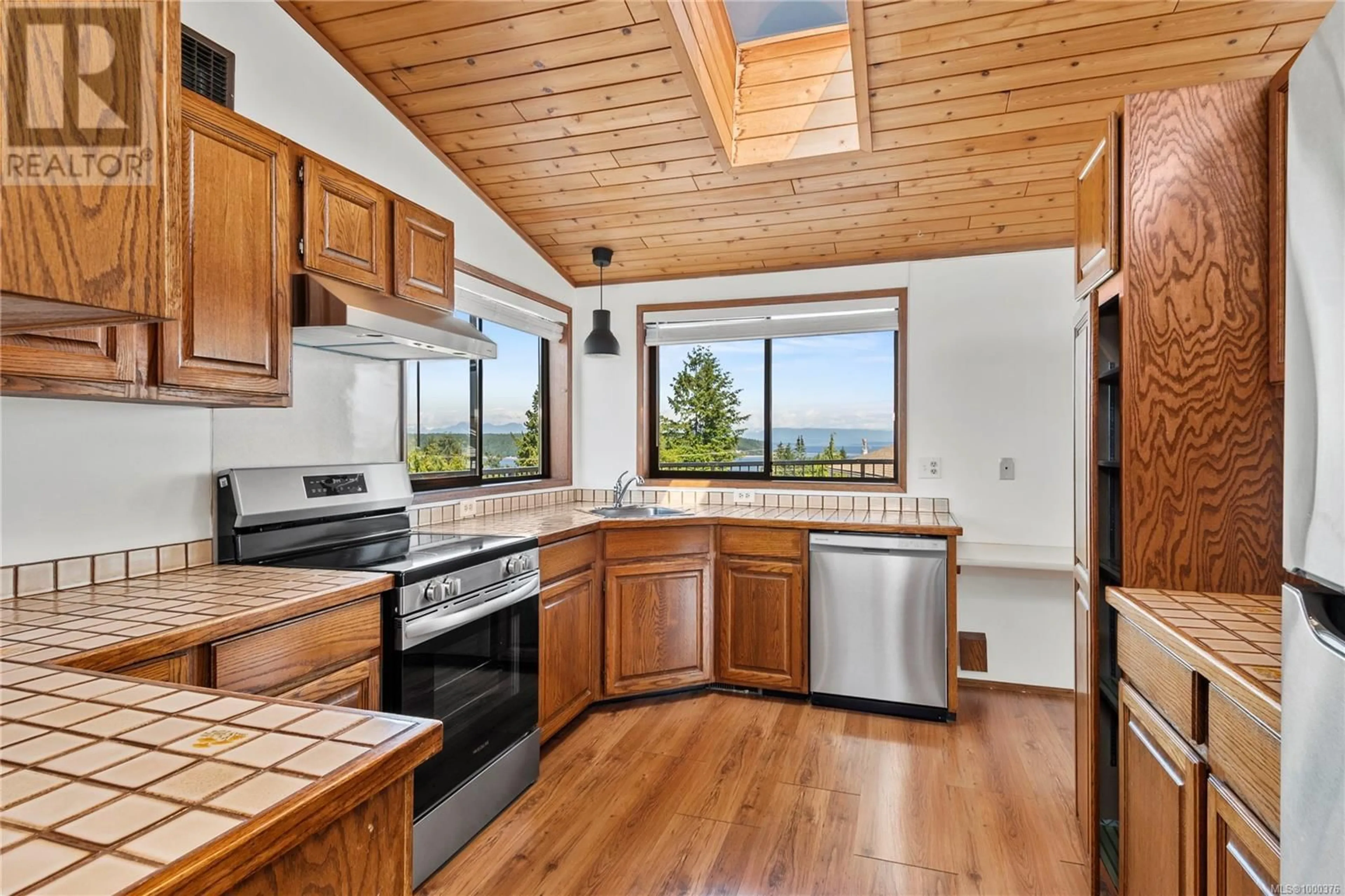 Open concept kitchen, unknown for 314 NILUHT ROAD, Campbell River British Columbia V9W1W8