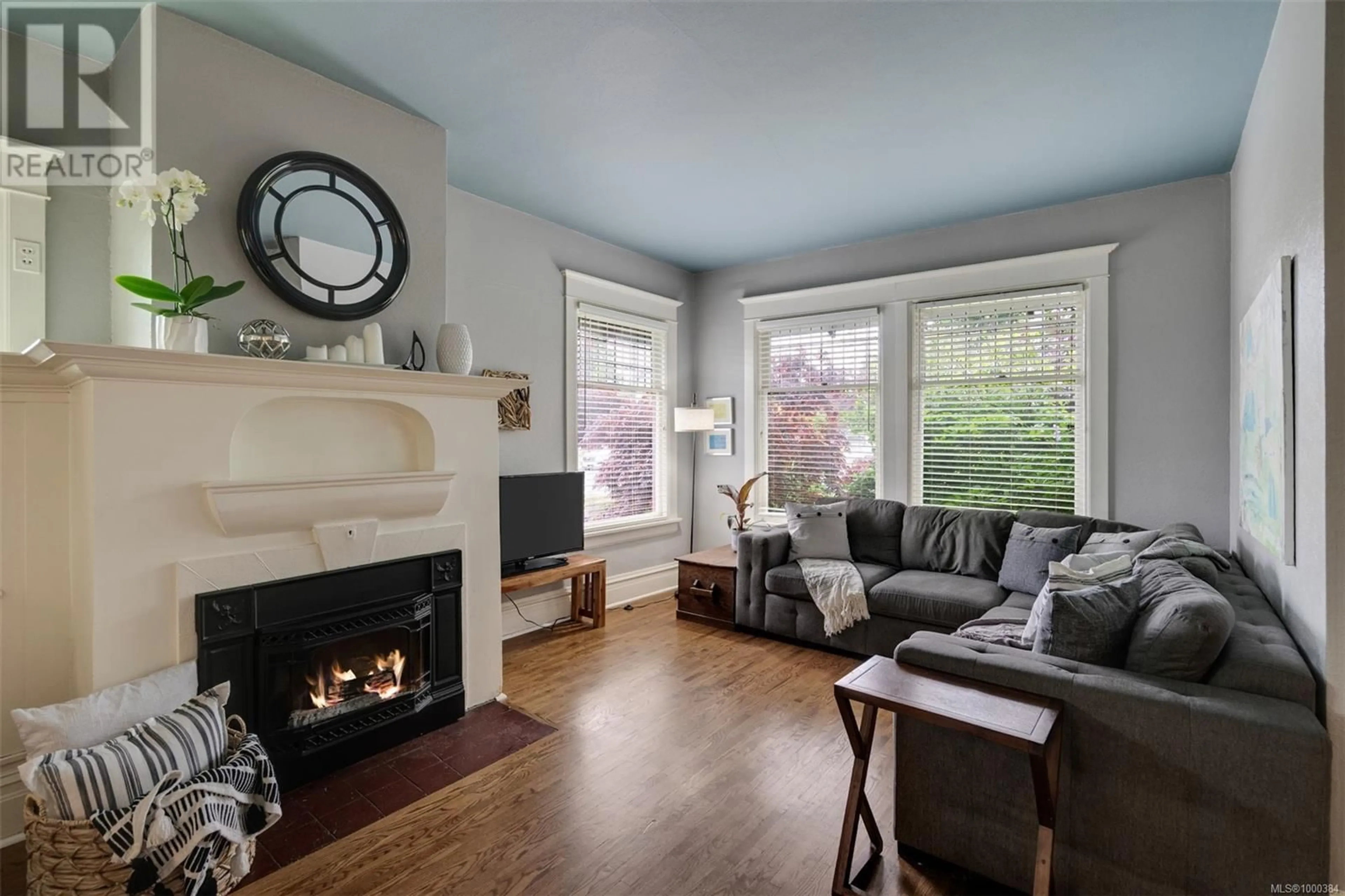 Living room with furniture, wood/laminate floor for 1241 JUNO STREET, Esquimalt British Columbia V9A5J9