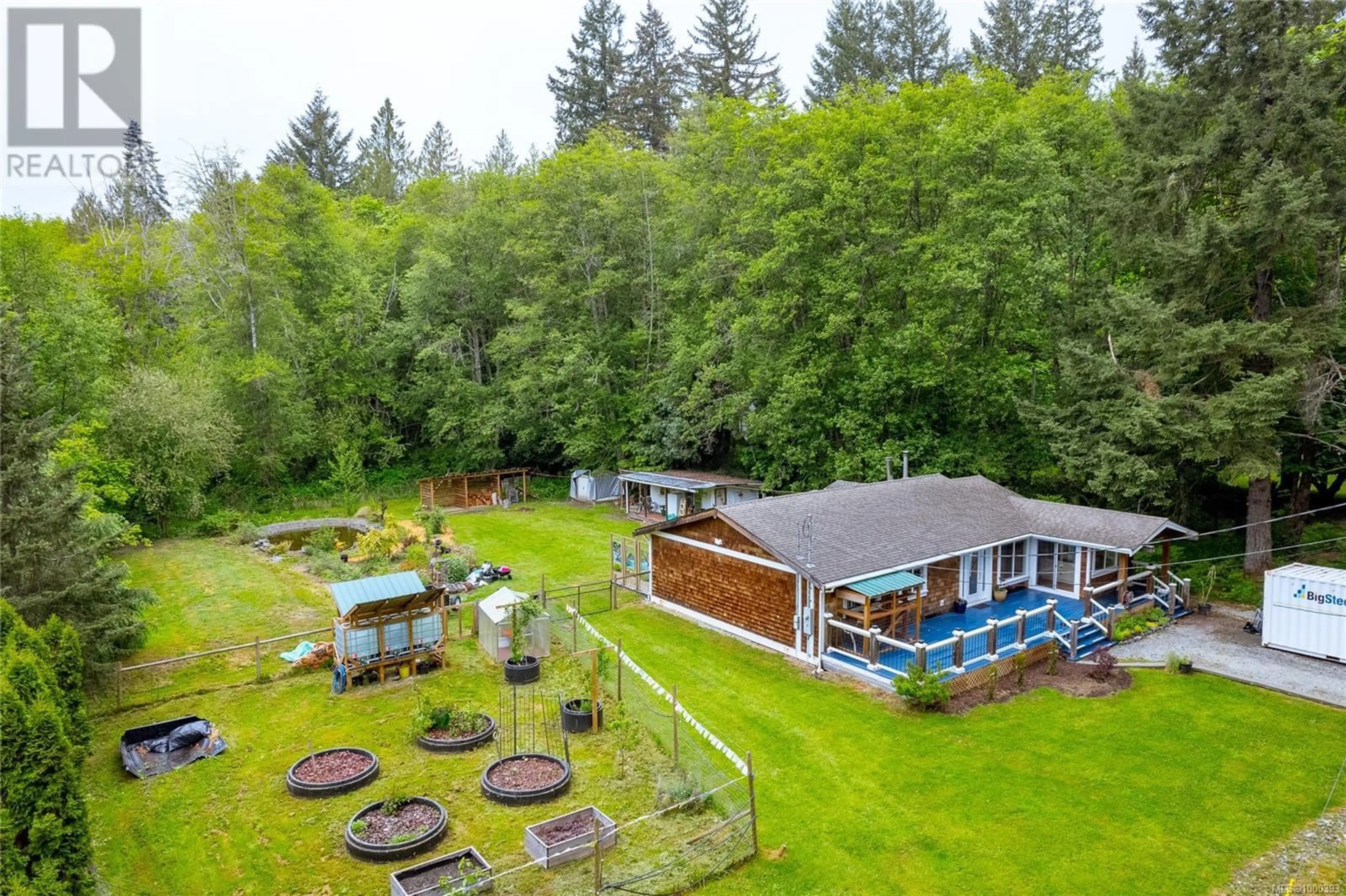 A pic from outside/outdoor area/front of a property/back of a property/a pic from drone, water/lake/river/ocean view for 7981 GREENDALE ROAD, Lake Cowichan British Columbia V0R2G0
