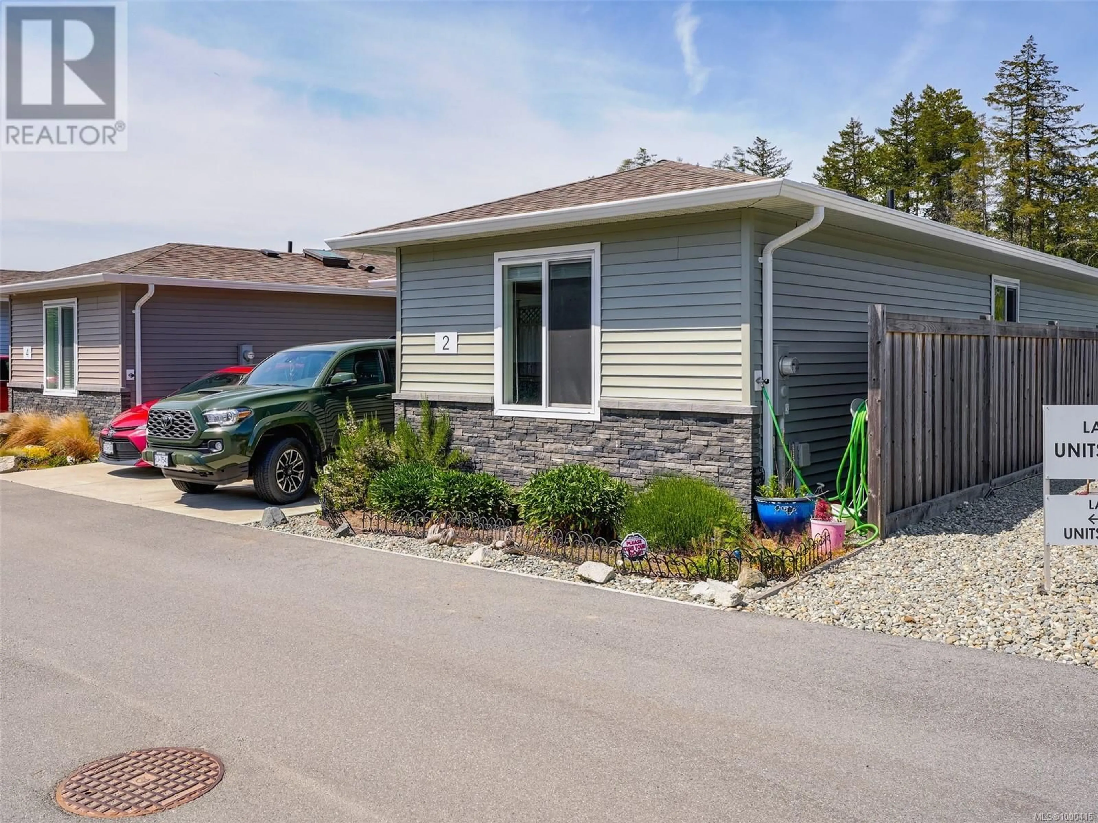 Home with vinyl exterior material, street for 2 - 7650 QWUC CHUS LANE, Central Saanich British Columbia V8M0B4