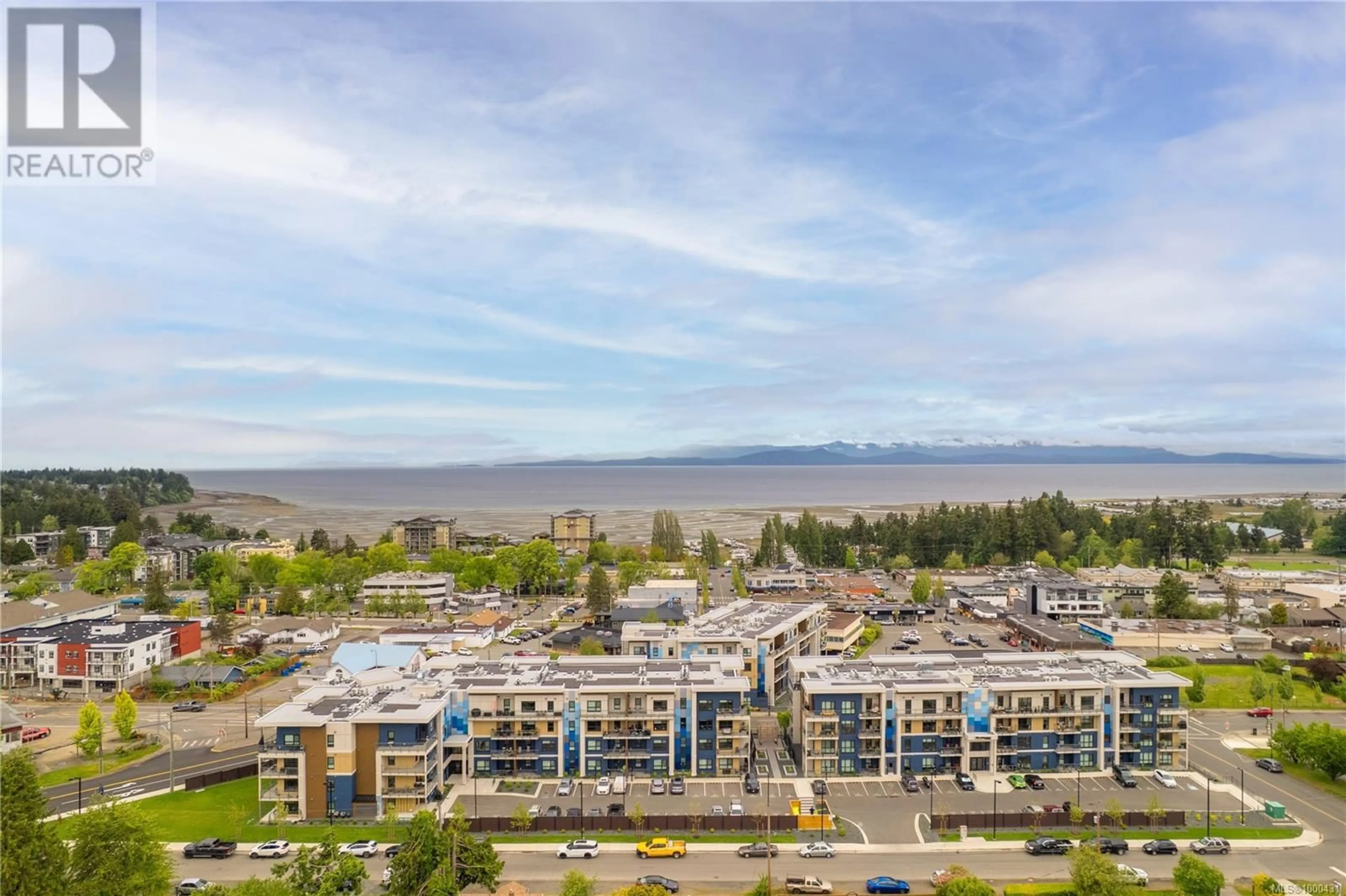 A pic from outside/outdoor area/front of a property/back of a property/a pic from drone, water/lake/river/ocean view for 212 - 140 JENSEN AVENUE WEST, Parksville British Columbia V9P0H7