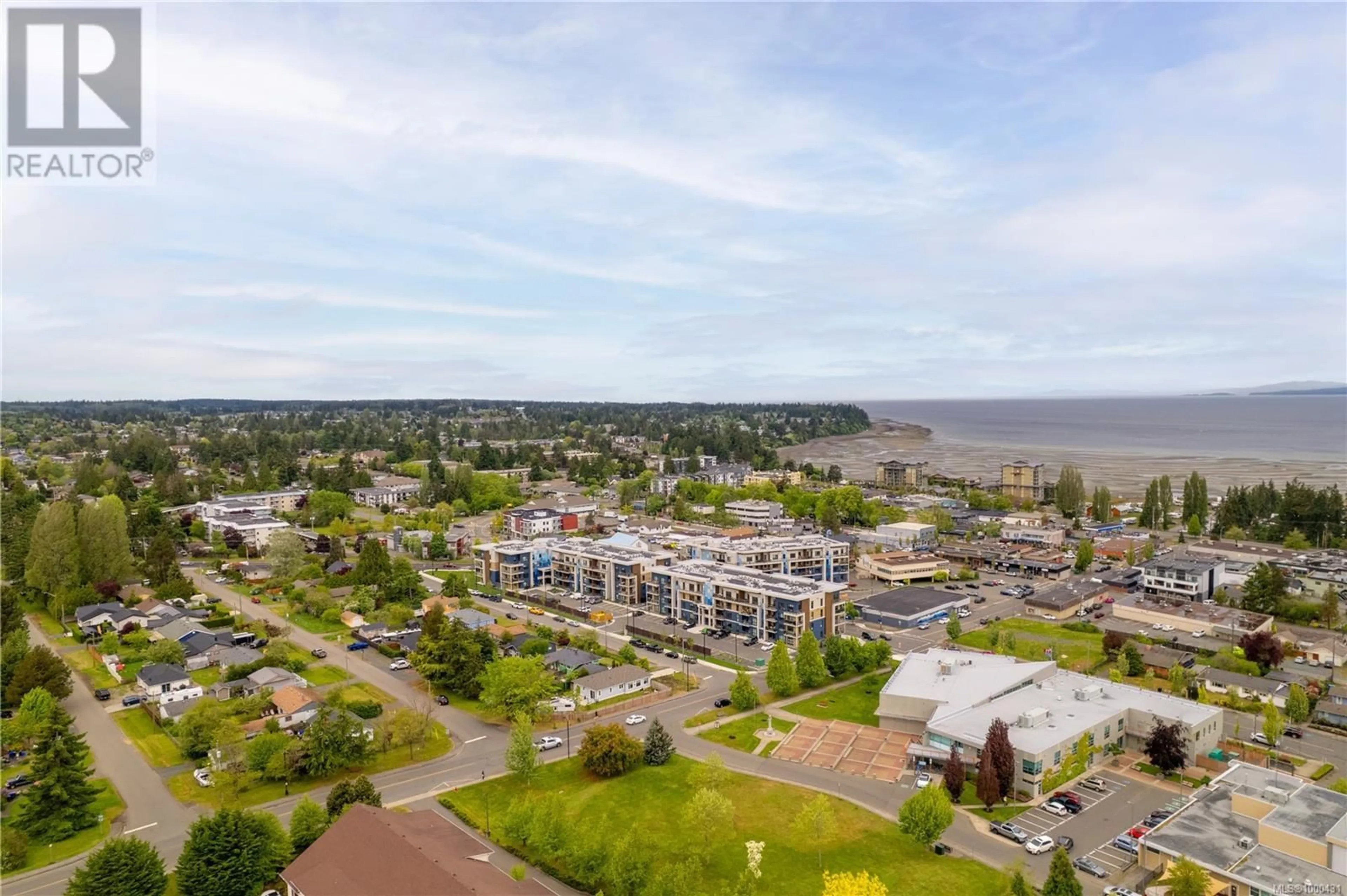 A pic from outside/outdoor area/front of a property/back of a property/a pic from drone, water/lake/river/ocean view for 212 - 140 JENSEN AVENUE WEST, Parksville British Columbia V9P0H7