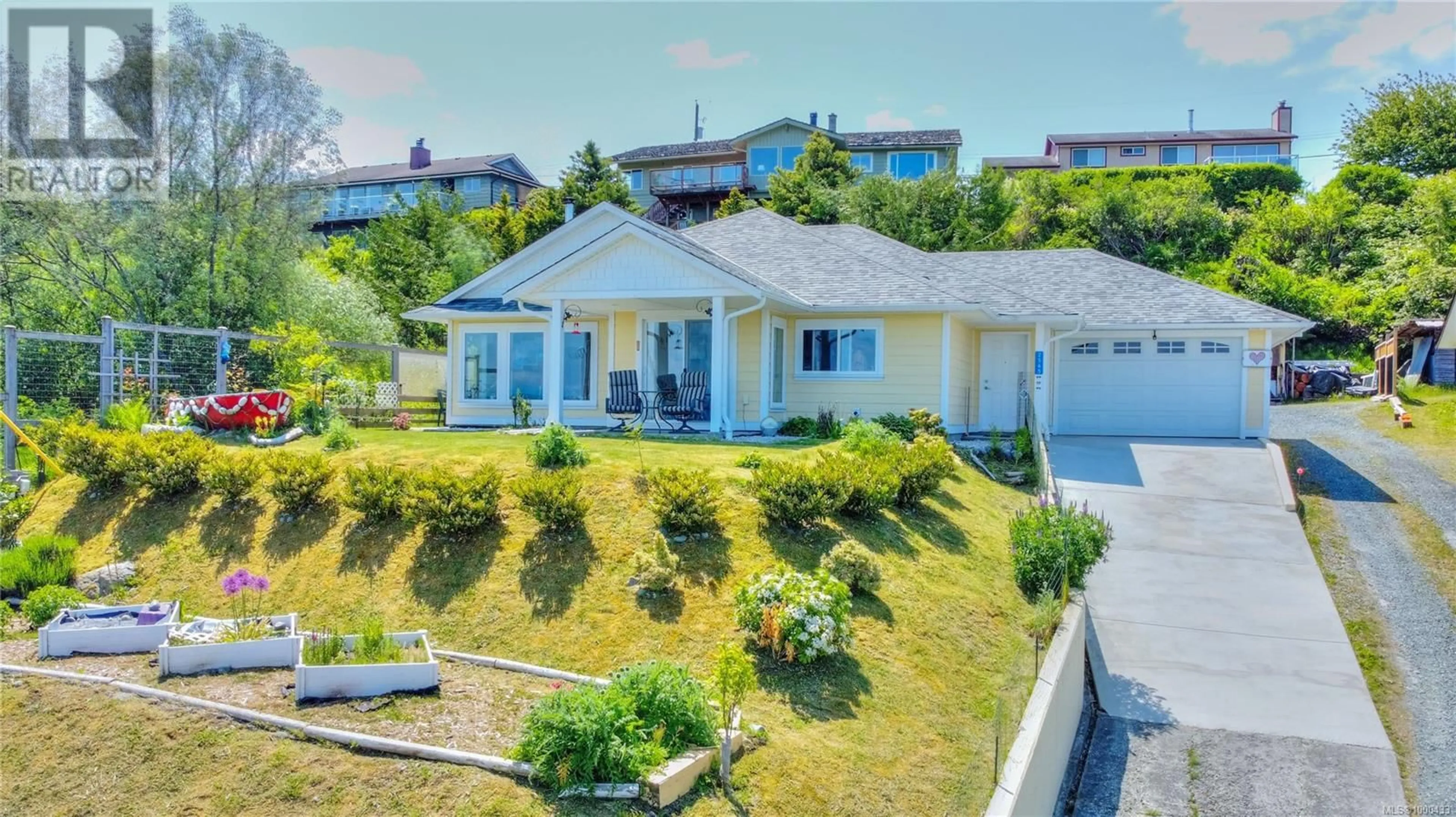 A pic from outside/outdoor area/front of a property/back of a property/a pic from drone, water/lake/river/ocean view for 2565 CARDENA CRESCENT, Port McNeill British Columbia V0N2R0