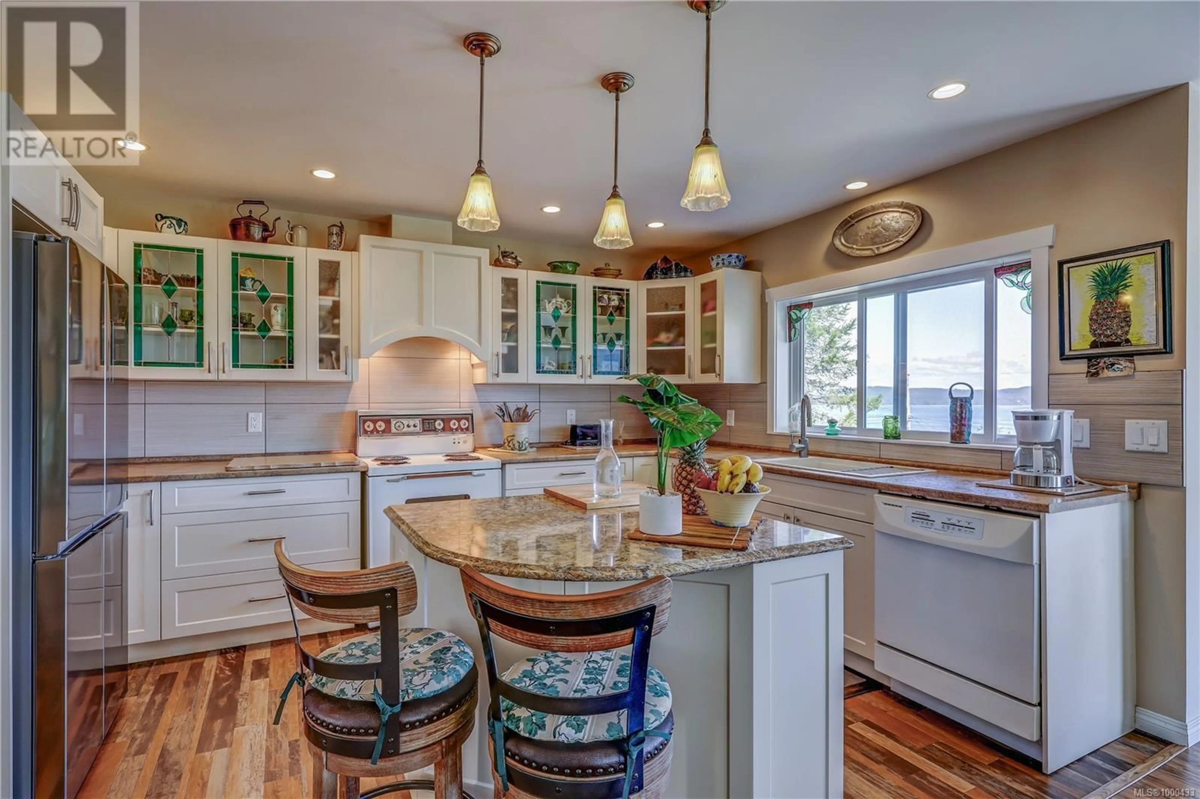 Open concept kitchen, ceramic/tile floor for 2565 CARDENA CRESCENT, Port McNeill British Columbia V0N2R0