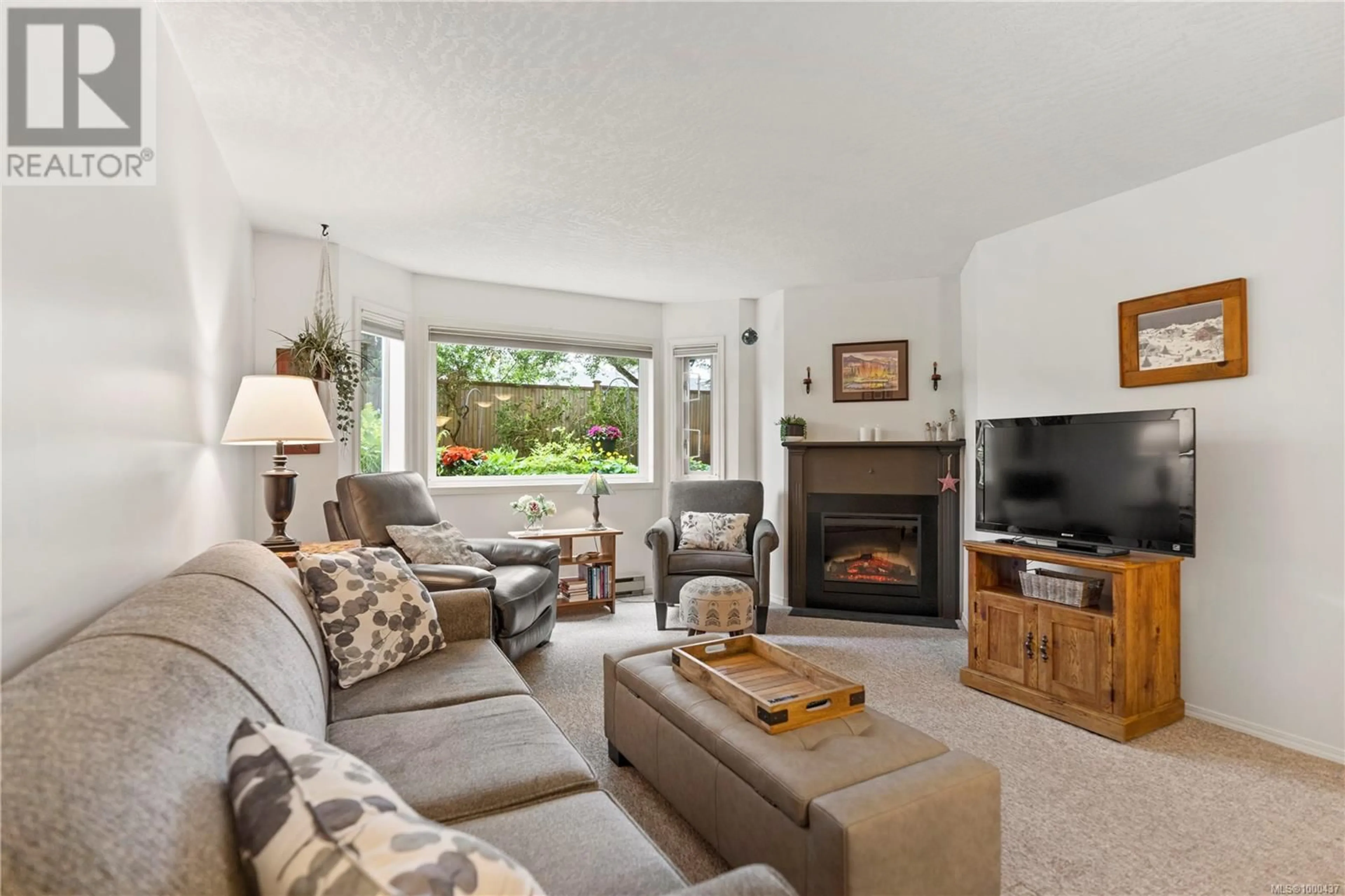 Living room with furniture, unknown for 104 - 9882 FIFTH STREET, Sidney British Columbia V8L2X3