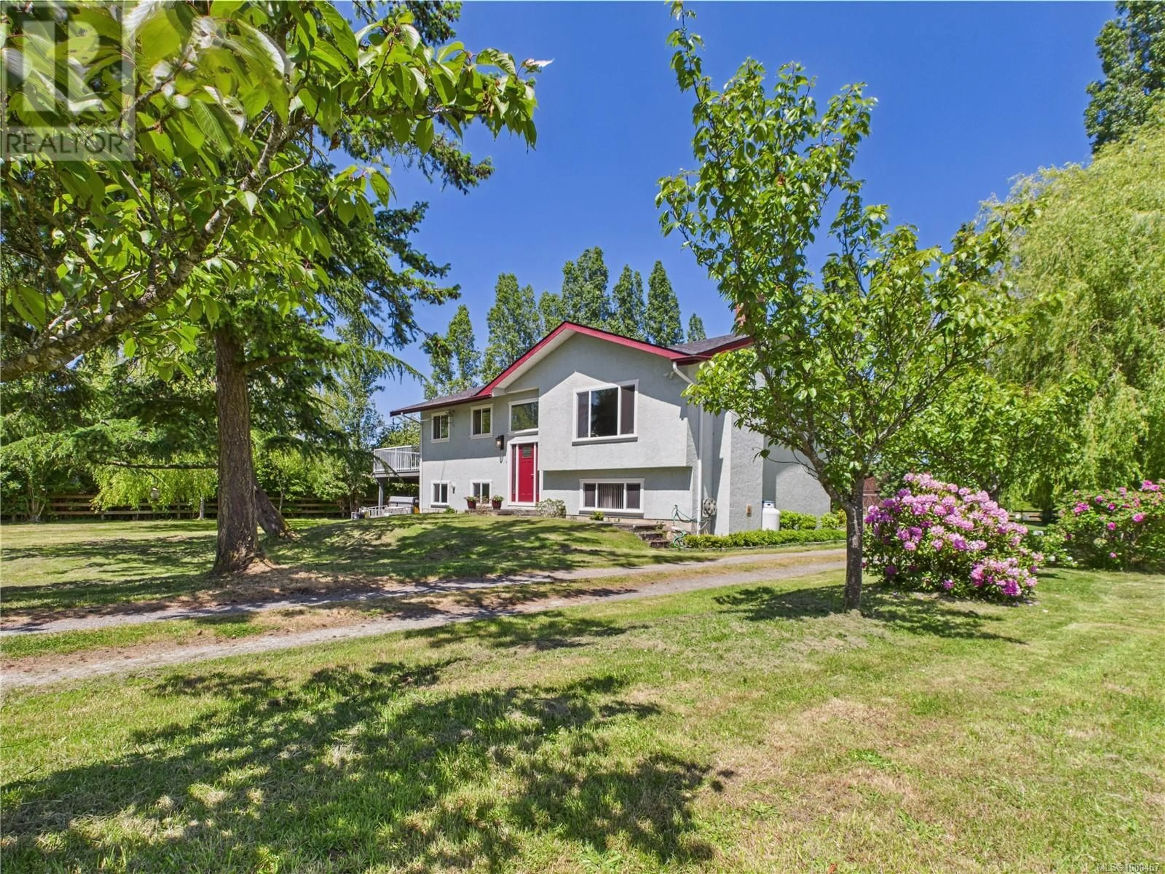 A pic from outside/outdoor area/front of a property/back of a property/a pic from drone, street for 1920 MILLS ROAD, North Saanich British Columbia V8L5S9