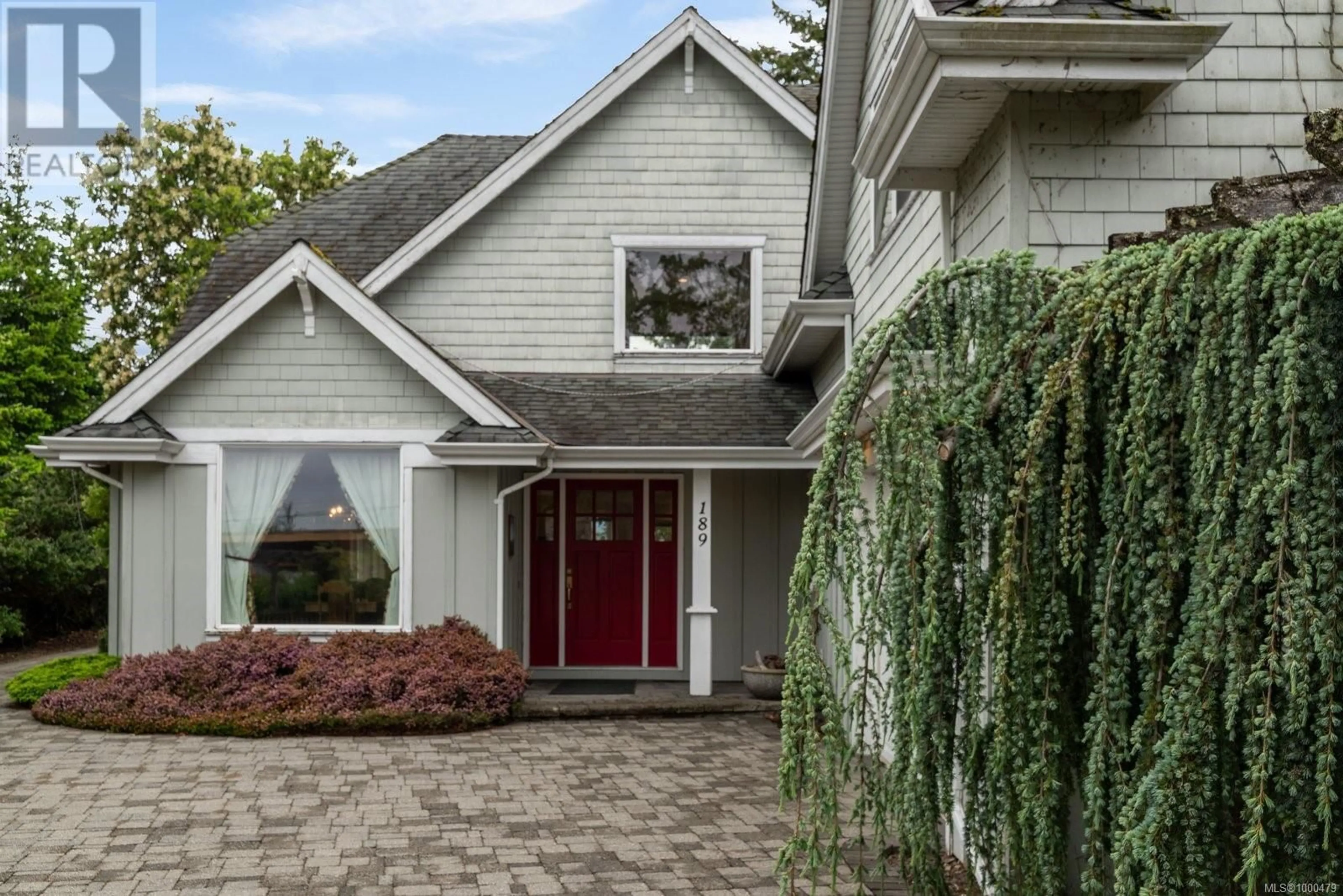 Home with vinyl exterior material, street for 189 COLVILLETON TRAIL, Protection Island British Columbia V9R6R1