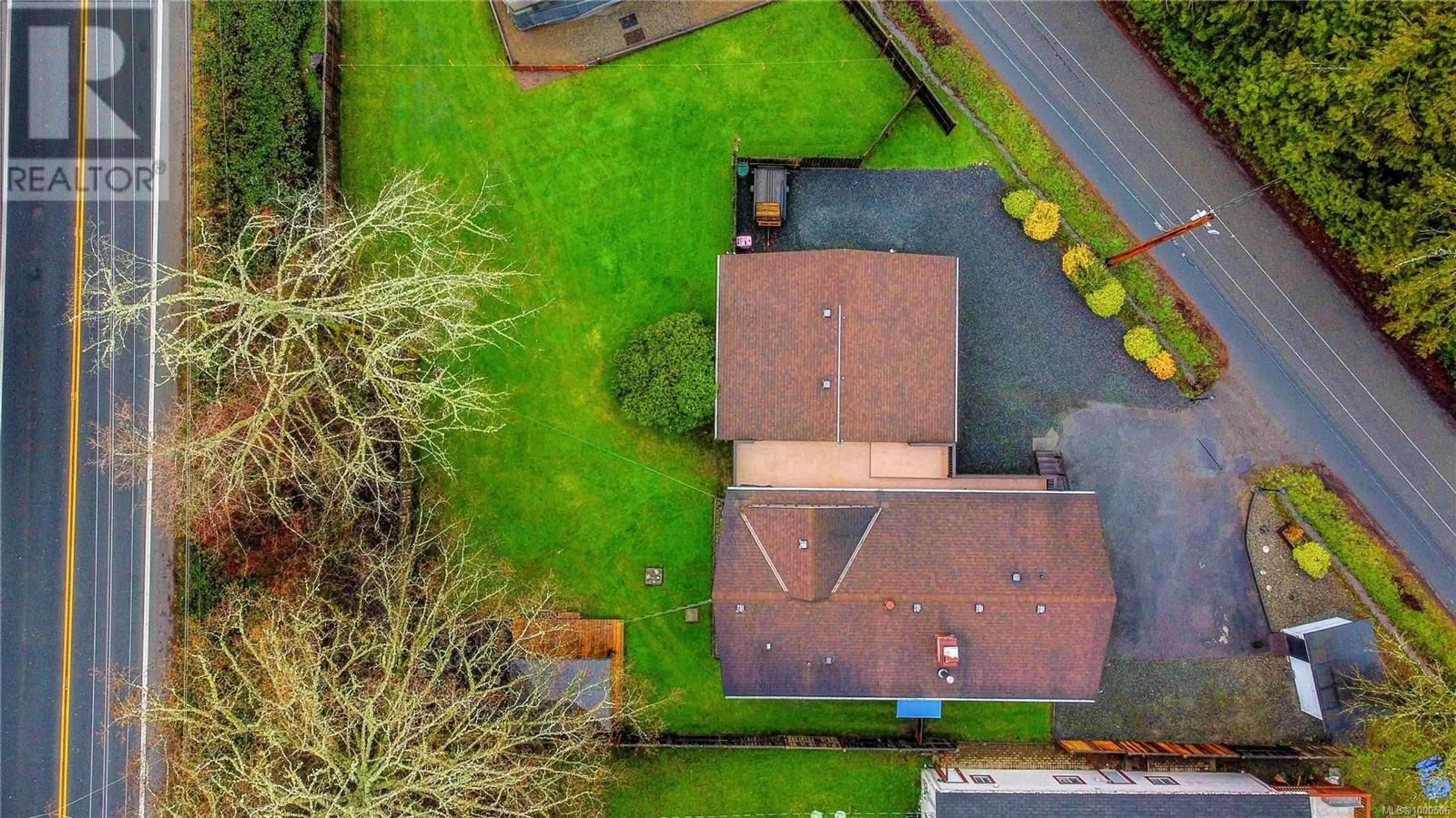 A pic from outside/outdoor area/front of a property/back of a property/a pic from drone, street for 5787 WOODLANDS ROAD, Sooke British Columbia V9Z0G4