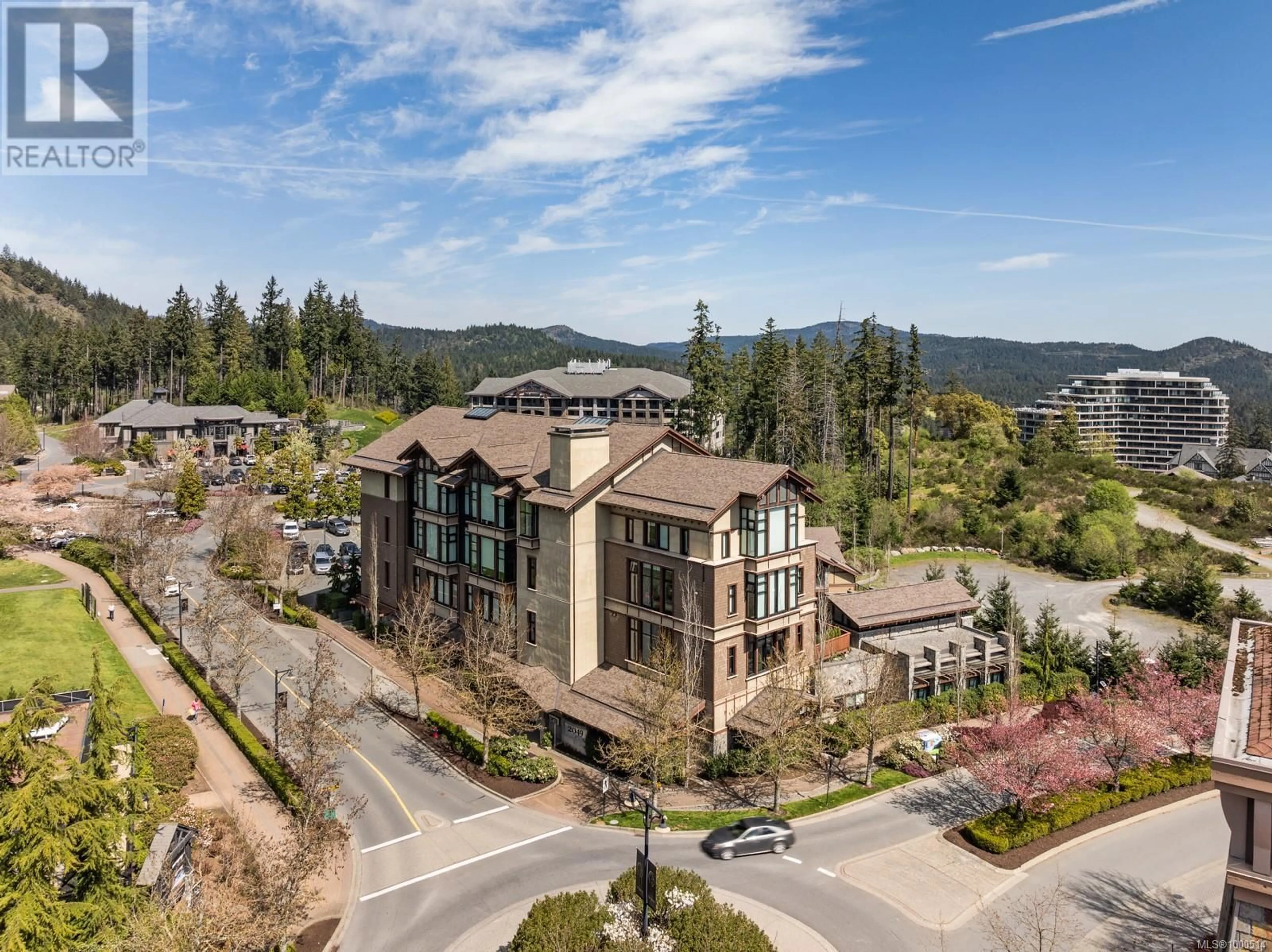 A pic from outside/outdoor area/front of a property/back of a property/a pic from drone, mountain view for 201 - 2049 COUNTRY CLUB WAY, Langford British Columbia V9B0H8