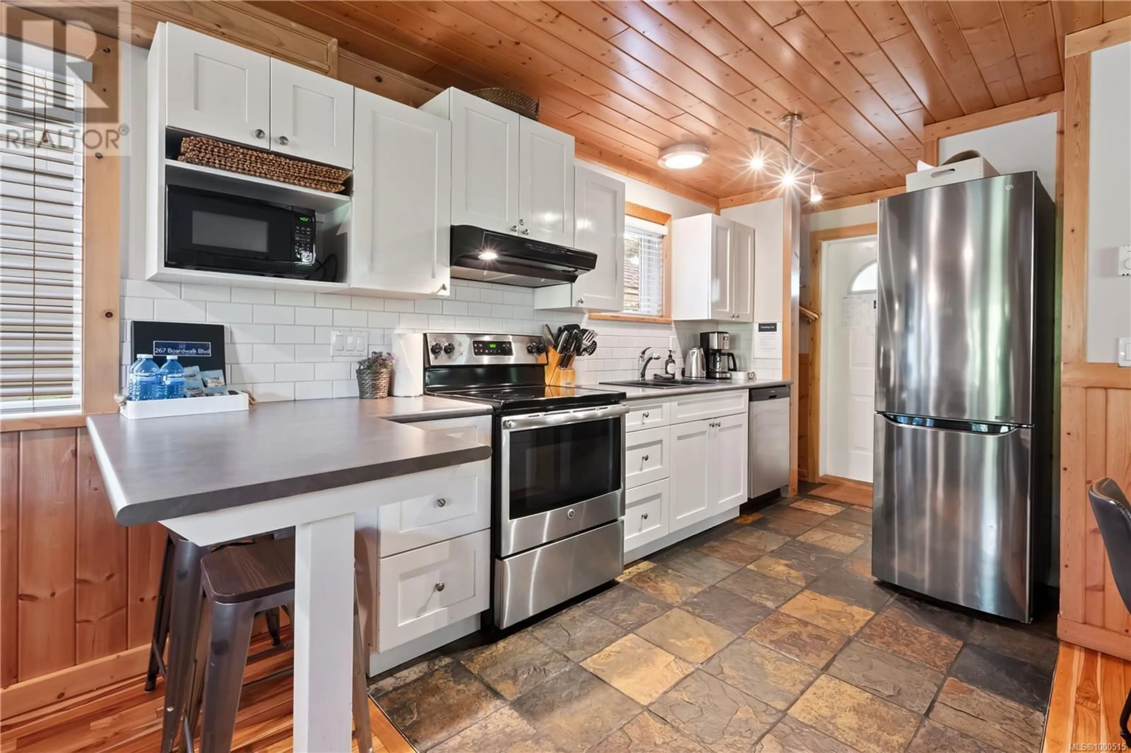 Open concept kitchen, ceramic/tile floor for 267 BOARDWALK BOULEVARD, Ucluelet British Columbia V0R3A0