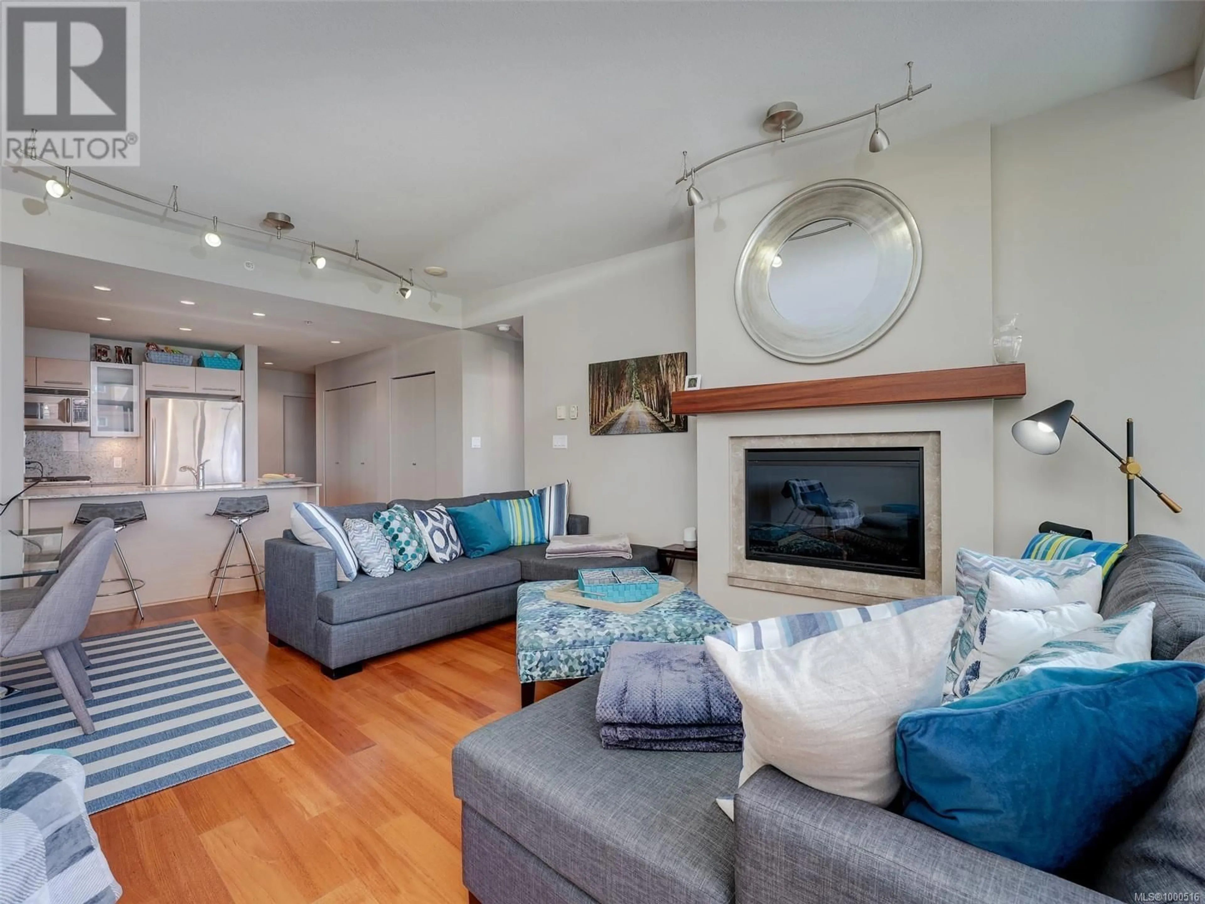 Living room with furniture, unknown for 205 - 68 SONGHEES ROAD, Victoria British Columbia V9A0A3