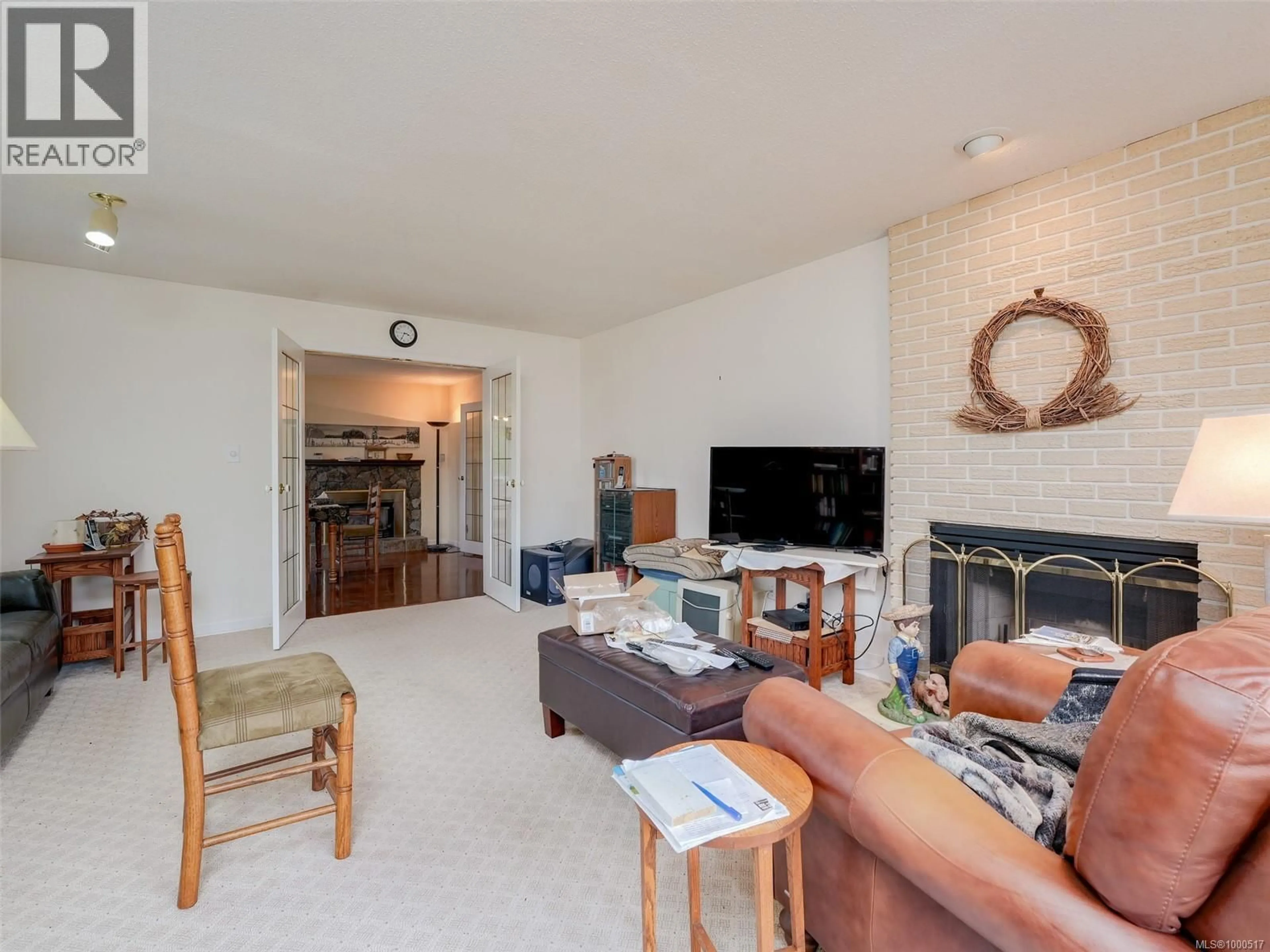 Living room with furniture, unknown for 4039 ANGELEAH PLACE, Saanich British Columbia V8Z6T1