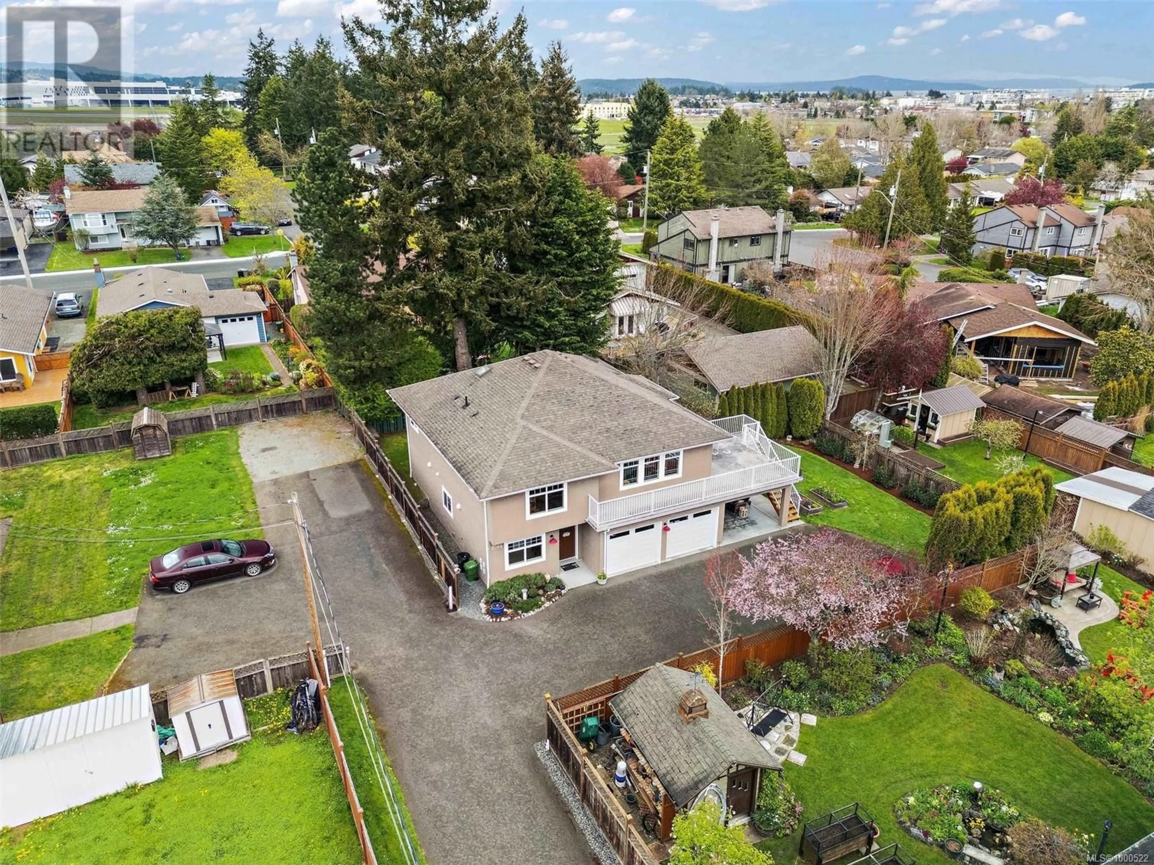 A pic from outside/outdoor area/front of a property/back of a property/a pic from drone, street for 2064 WEILER AVENUE, Sidney British Columbia V8L1R4