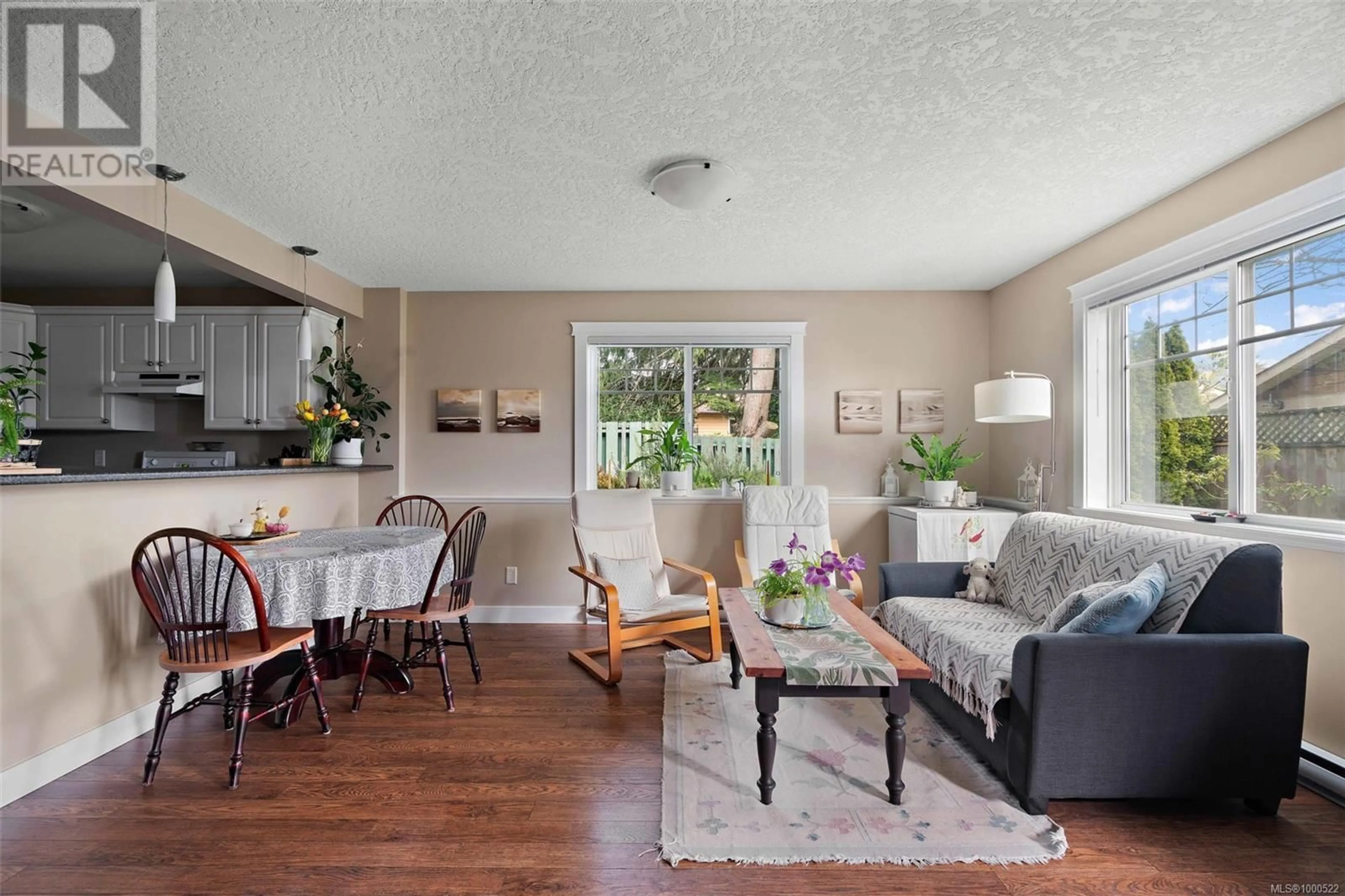 Living room with furniture, wood/laminate floor for 2064 WEILER AVENUE, Sidney British Columbia V8L1R4