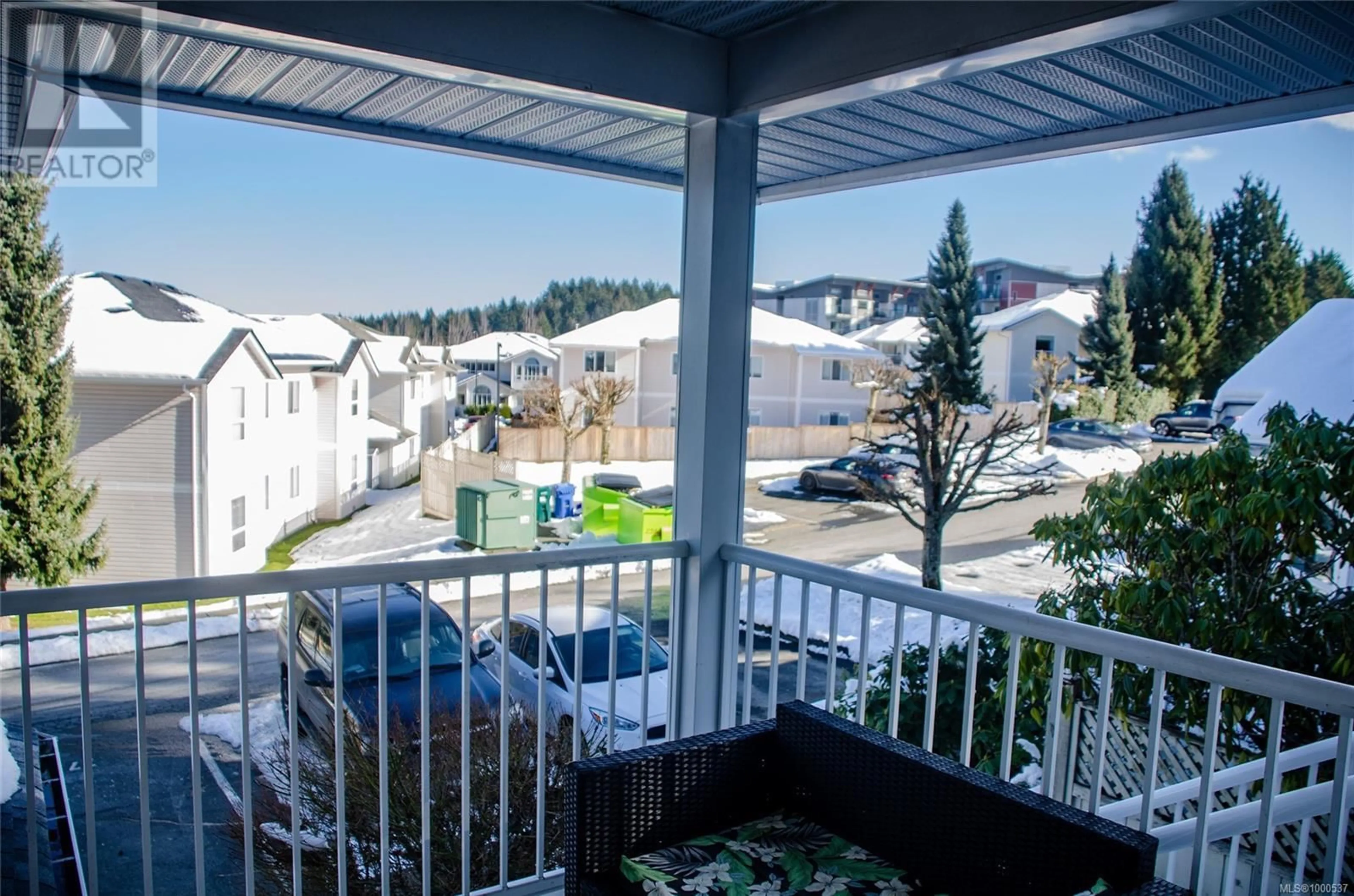Patio, city buildings view from balcony for 6112 CEDAR GROVE DRIVE, Nanaimo British Columbia V9T6G1