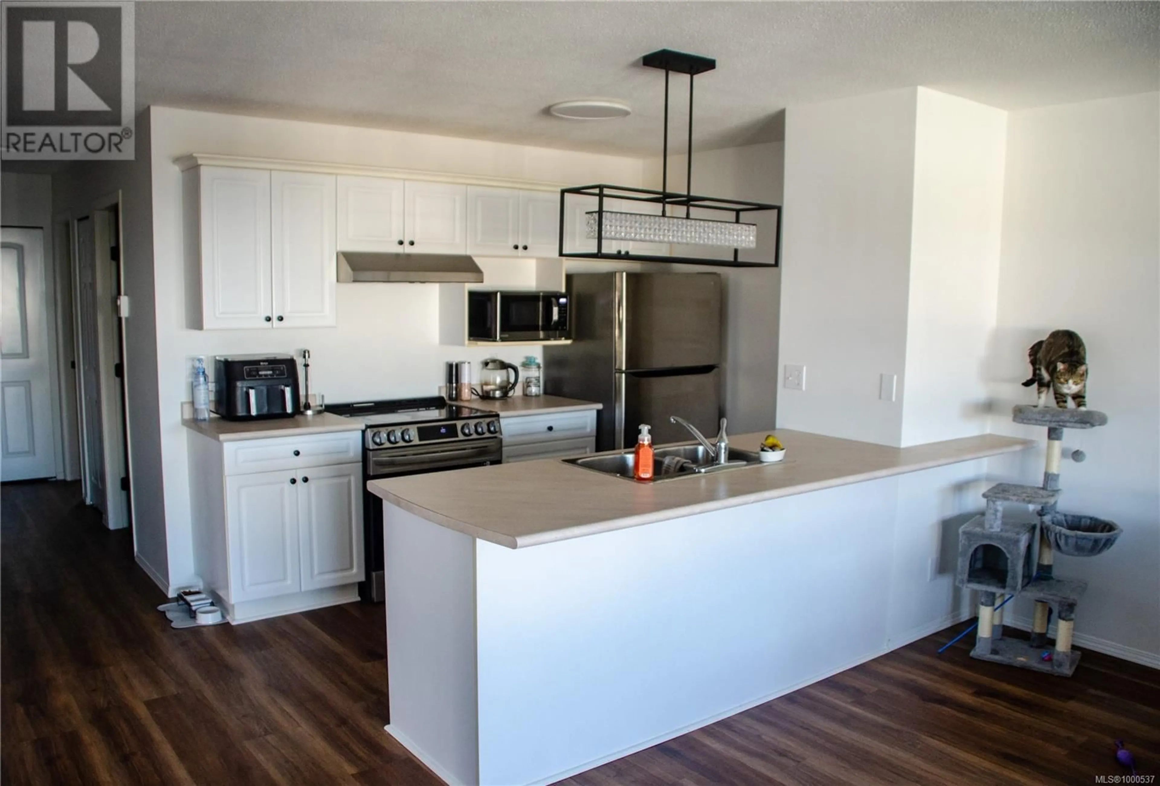 Open concept kitchen, wood/laminate floor for 6112 CEDAR GROVE DRIVE, Nanaimo British Columbia V9T6G1