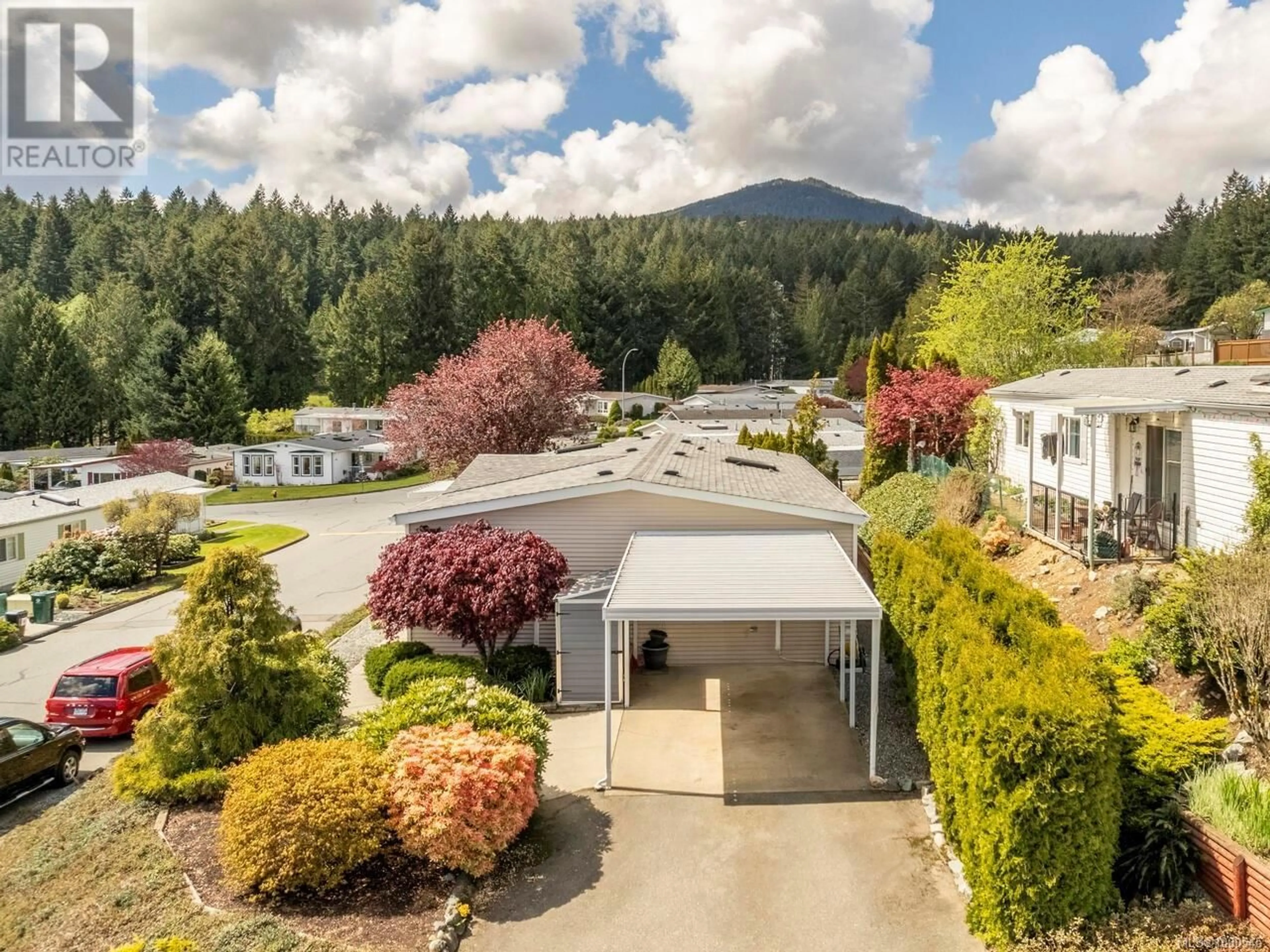 A pic from outside/outdoor area/front of a property/back of a property/a pic from drone, mountain view for 1177 MORRELL CIRCLE, Nanaimo British Columbia V9R6K6