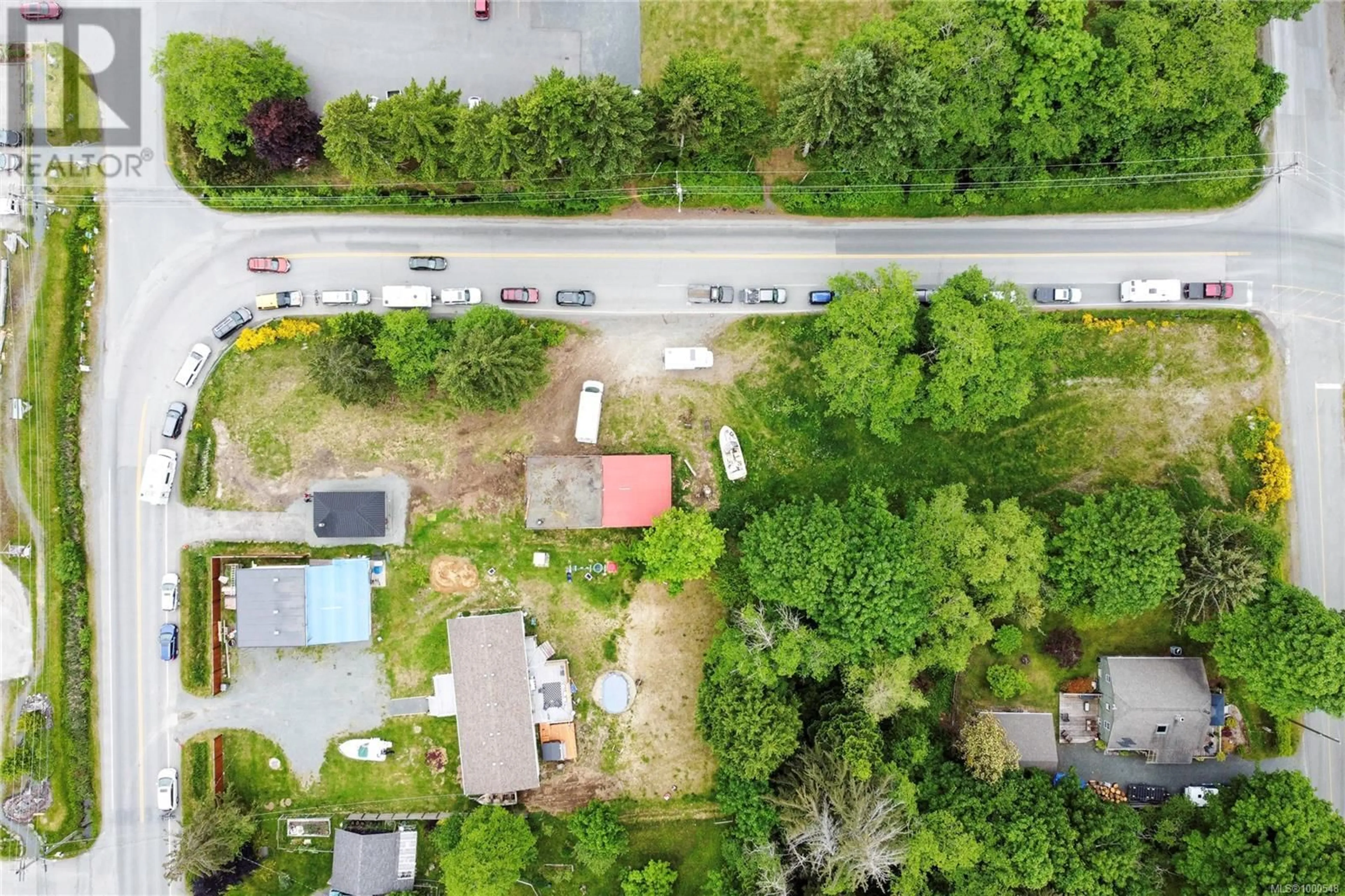 A pic from outside/outdoor area/front of a property/back of a property/a pic from drone, street for 670 QUATHIASKI COVE ROAD, Quadra Island British Columbia V0P1N0