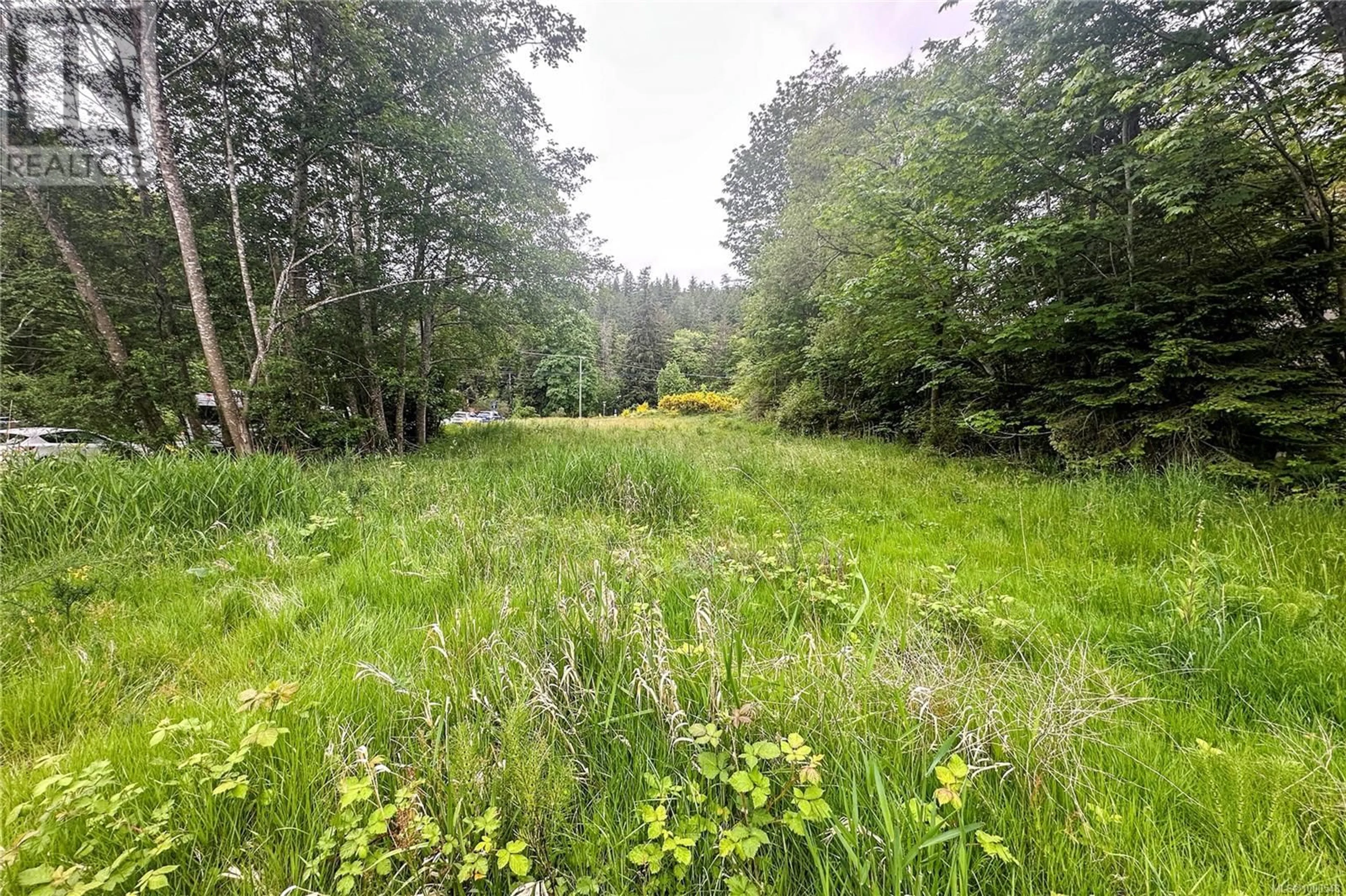 A pic from outside/outdoor area/front of a property/back of a property/a pic from drone, forest/trees view for 670 QUATHIASKI COVE ROAD, Quadra Island British Columbia V0P1N0