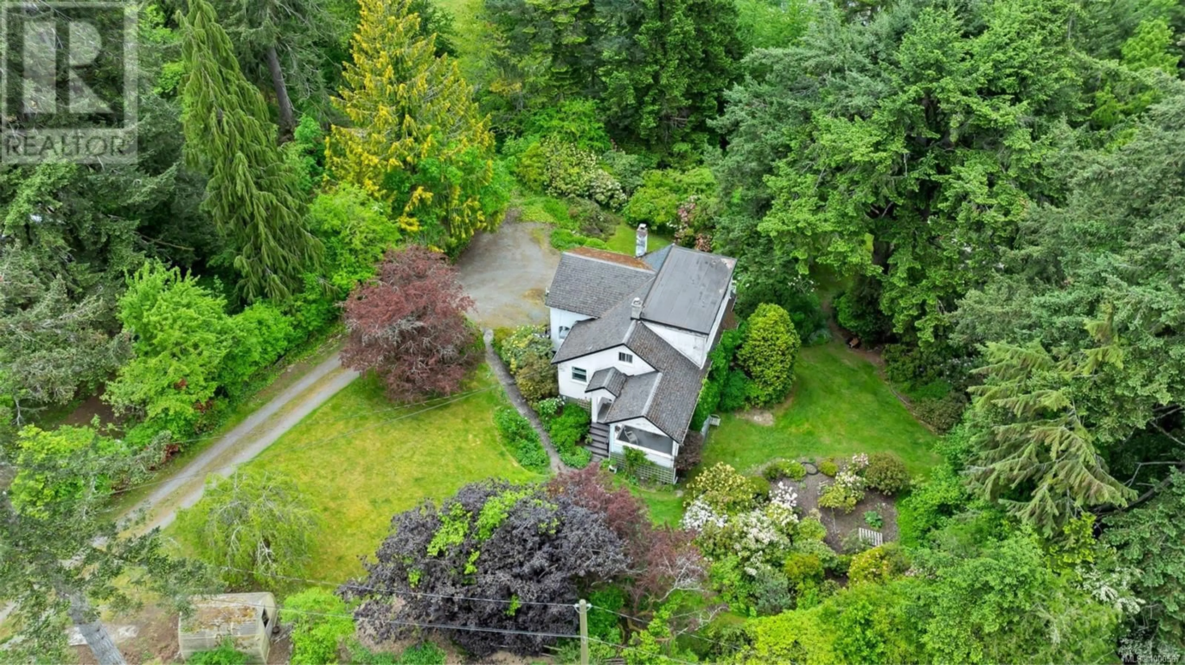 A pic from outside/outdoor area/front of a property/back of a property/a pic from drone, street for 2130 COWICHAN BAY ROAD, Cowichan Bay British Columbia V0R1N1