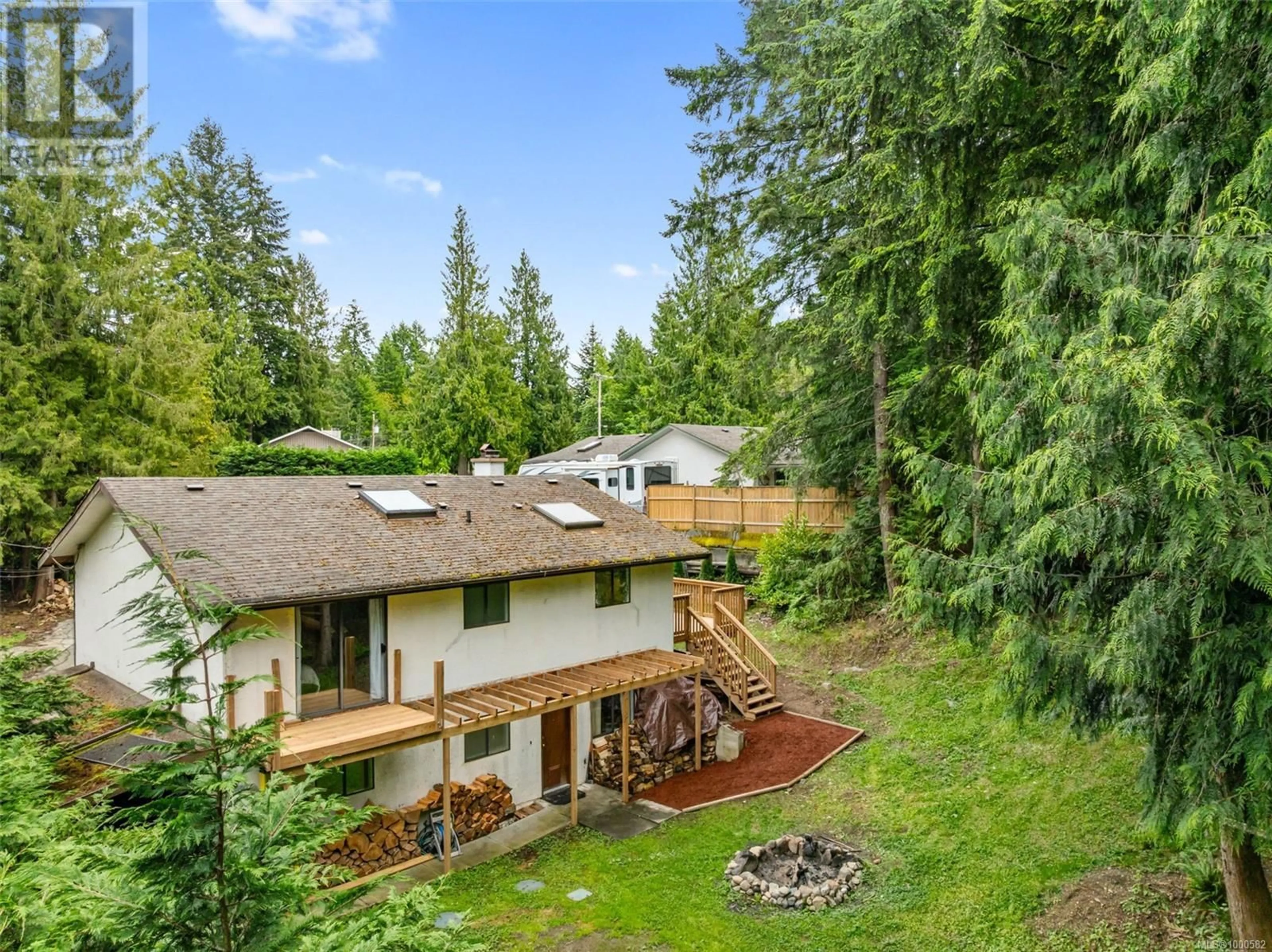 A pic from outside/outdoor area/front of a property/back of a property/a pic from drone, forest/trees view for 2710 BOB-O-LINK DRIVE, Shawnigan Lake British Columbia V8H3A2