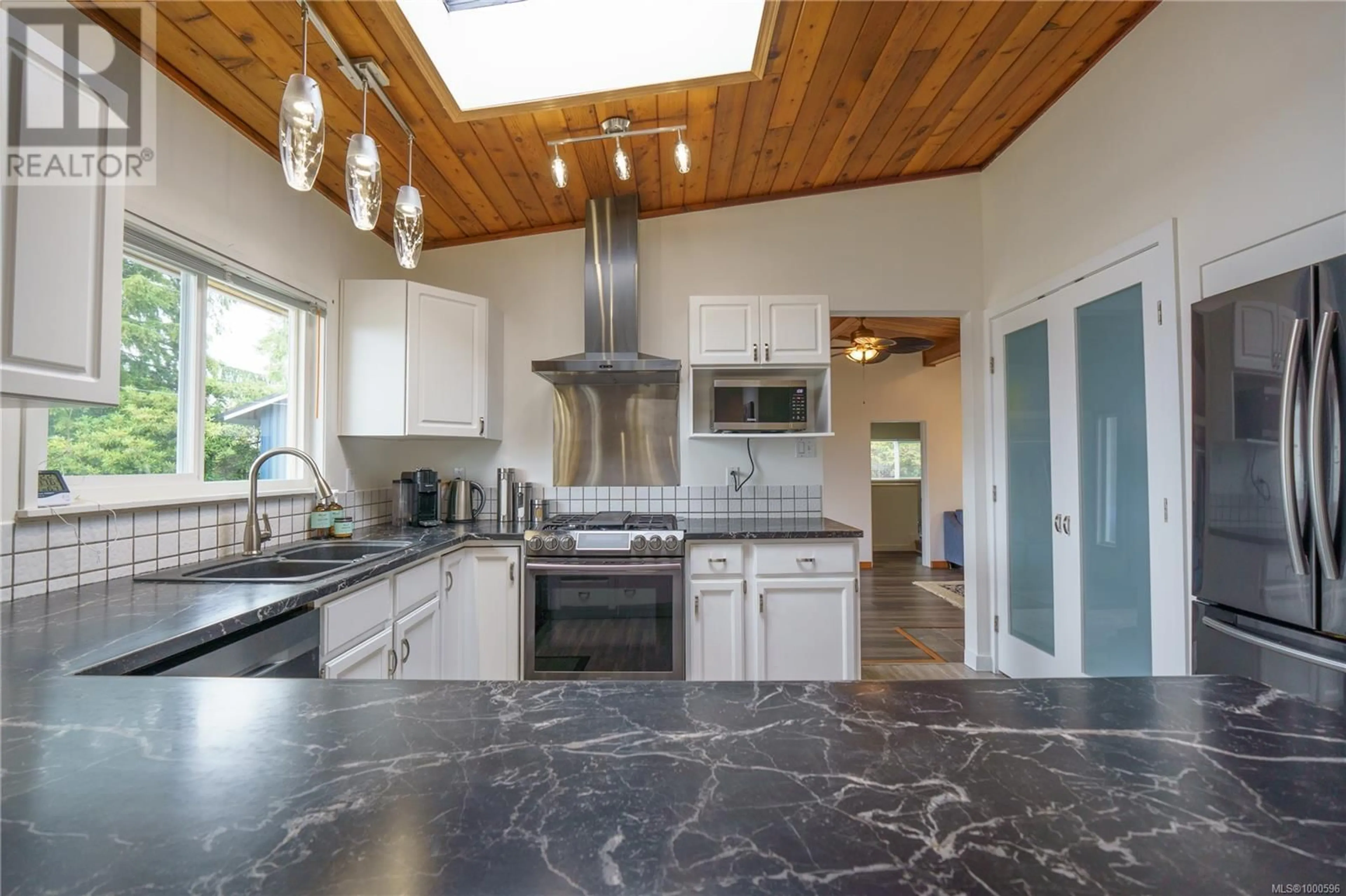 Contemporary kitchen, ceramic/tile floor for 204 BIRCH STREET, Ucluelet British Columbia V0R3A0