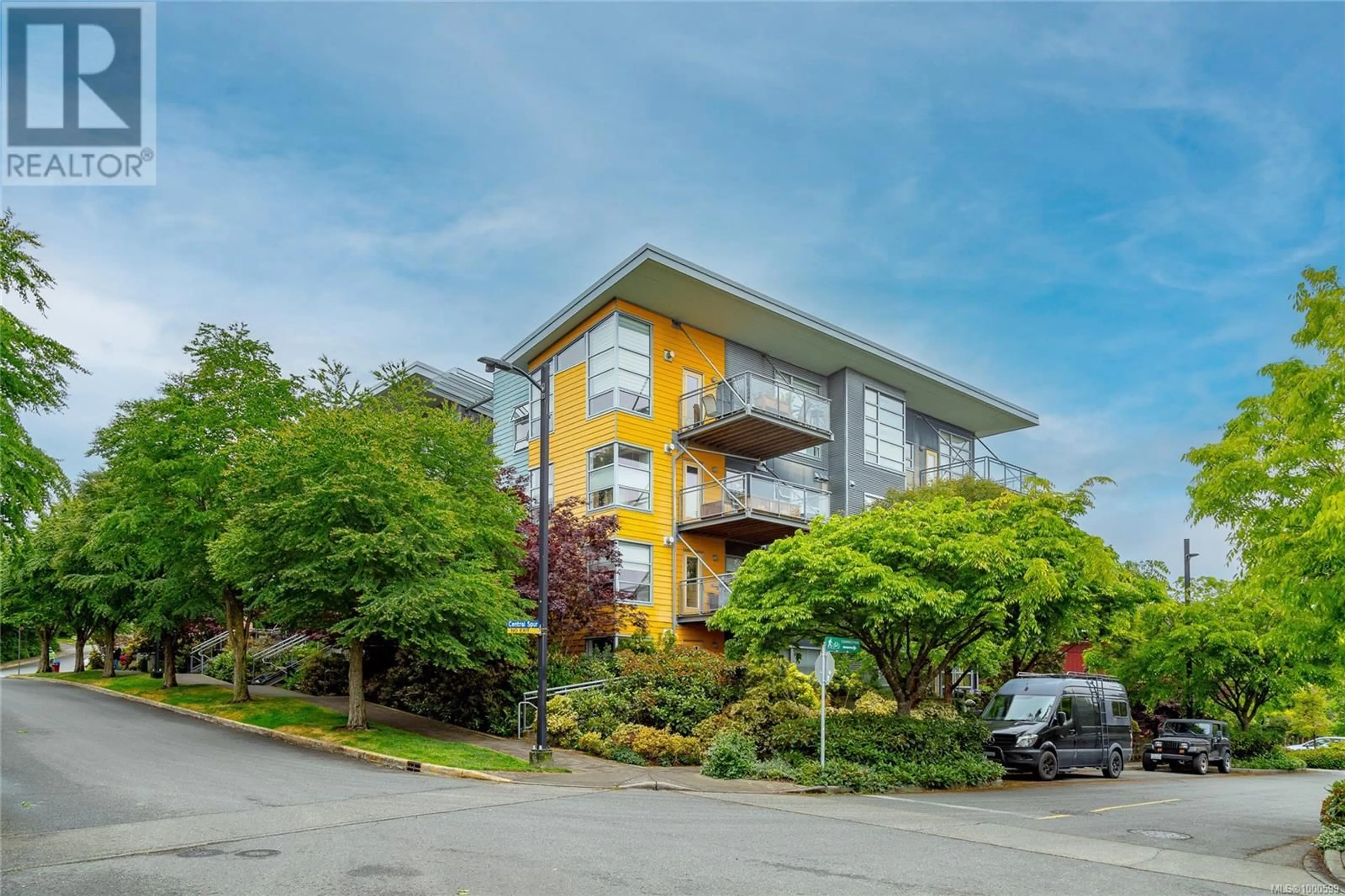 A pic from outside/outdoor area/front of a property/back of a property/a pic from drone, unknown for 311 - 90 REGATTA LANDING, Victoria British Columbia V9A7R2