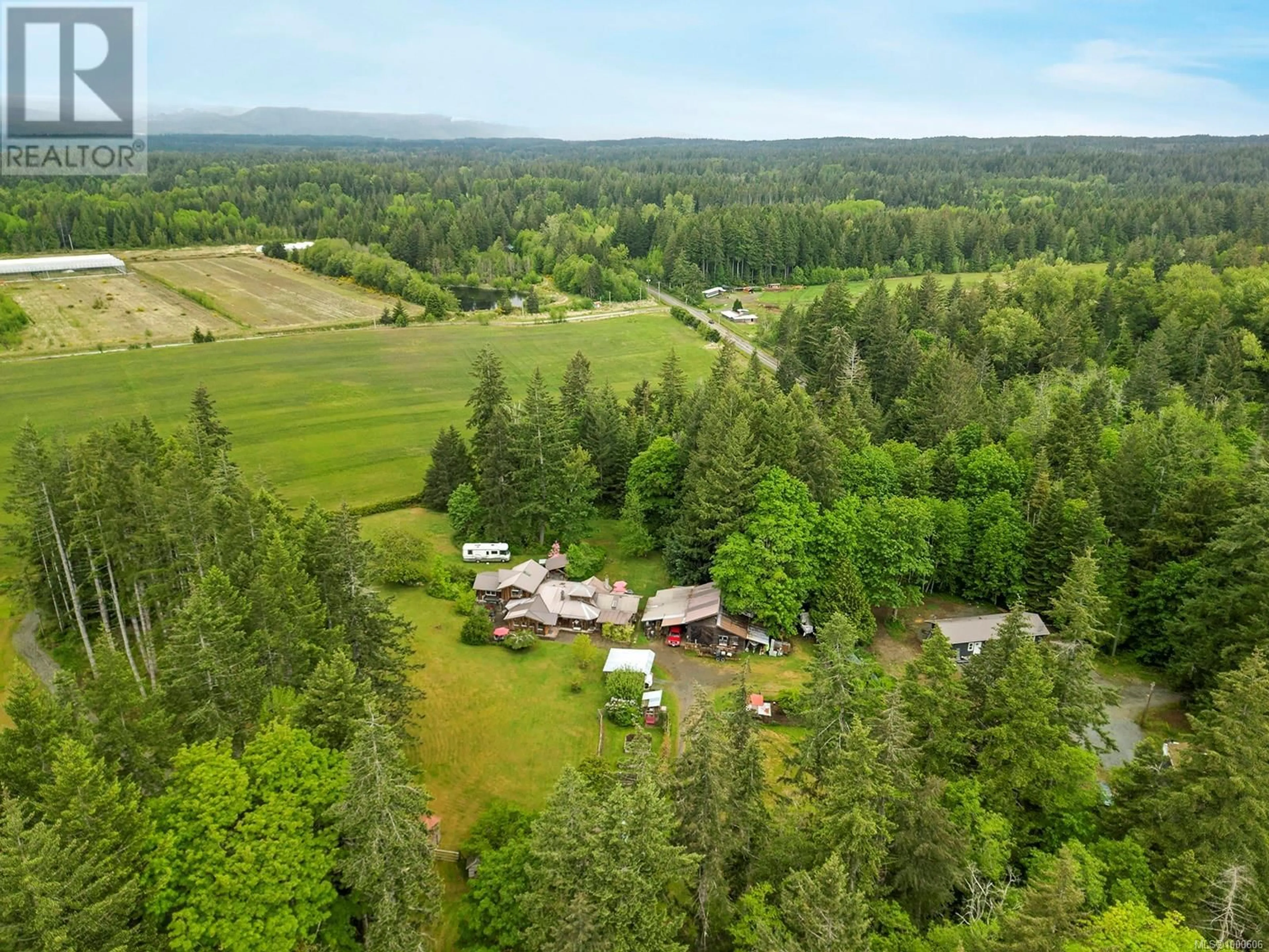 A pic from outside/outdoor area/front of a property/back of a property/a pic from drone, forest/trees view for 5965 LOXLEY ROAD, Courtenay British Columbia V9J1V9