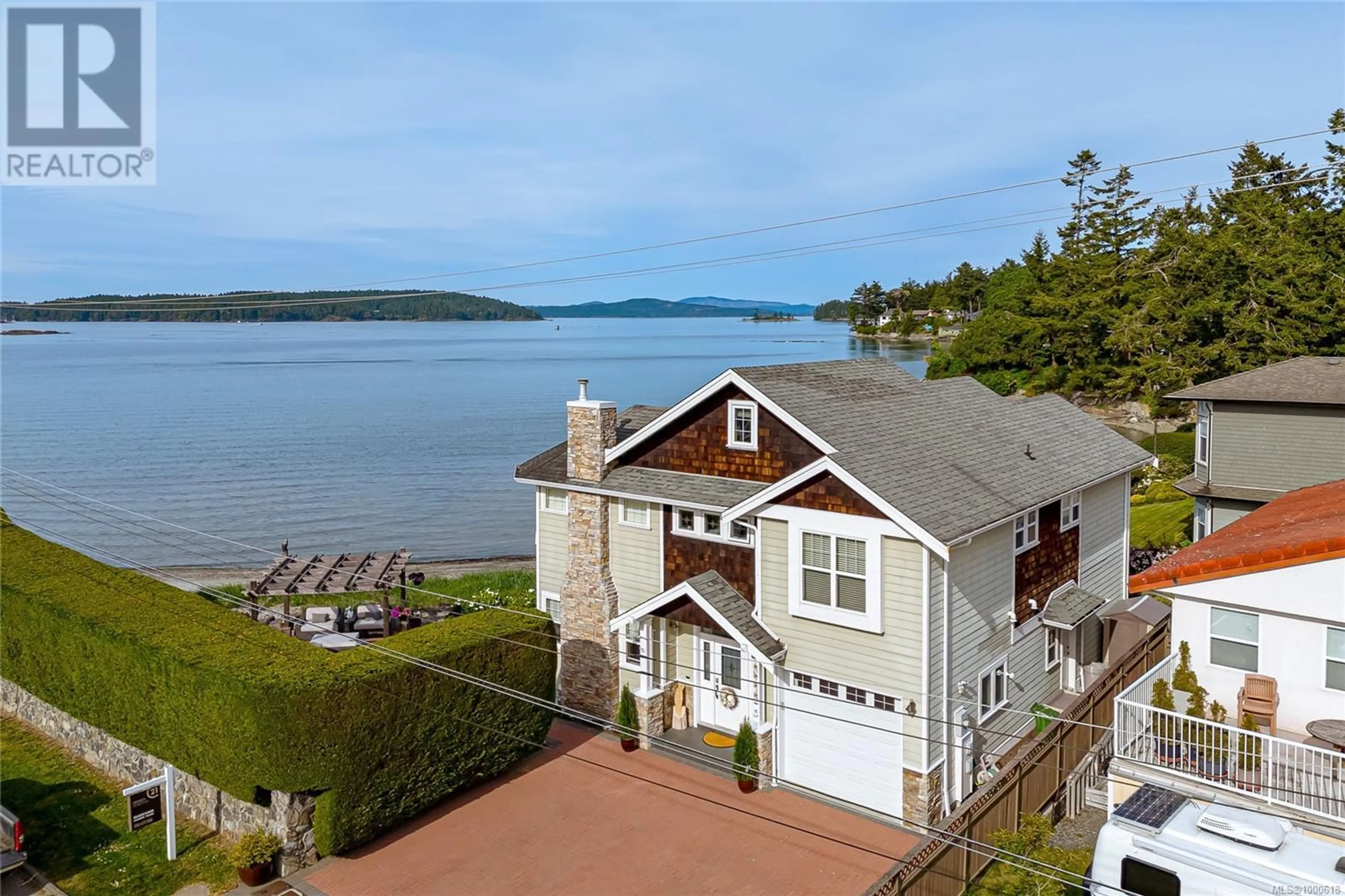 A pic from outside/outdoor area/front of a property/back of a property/a pic from drone, water/lake/river/ocean view for 10239 FIFTH STREET, Sidney British Columbia V8L2Y4