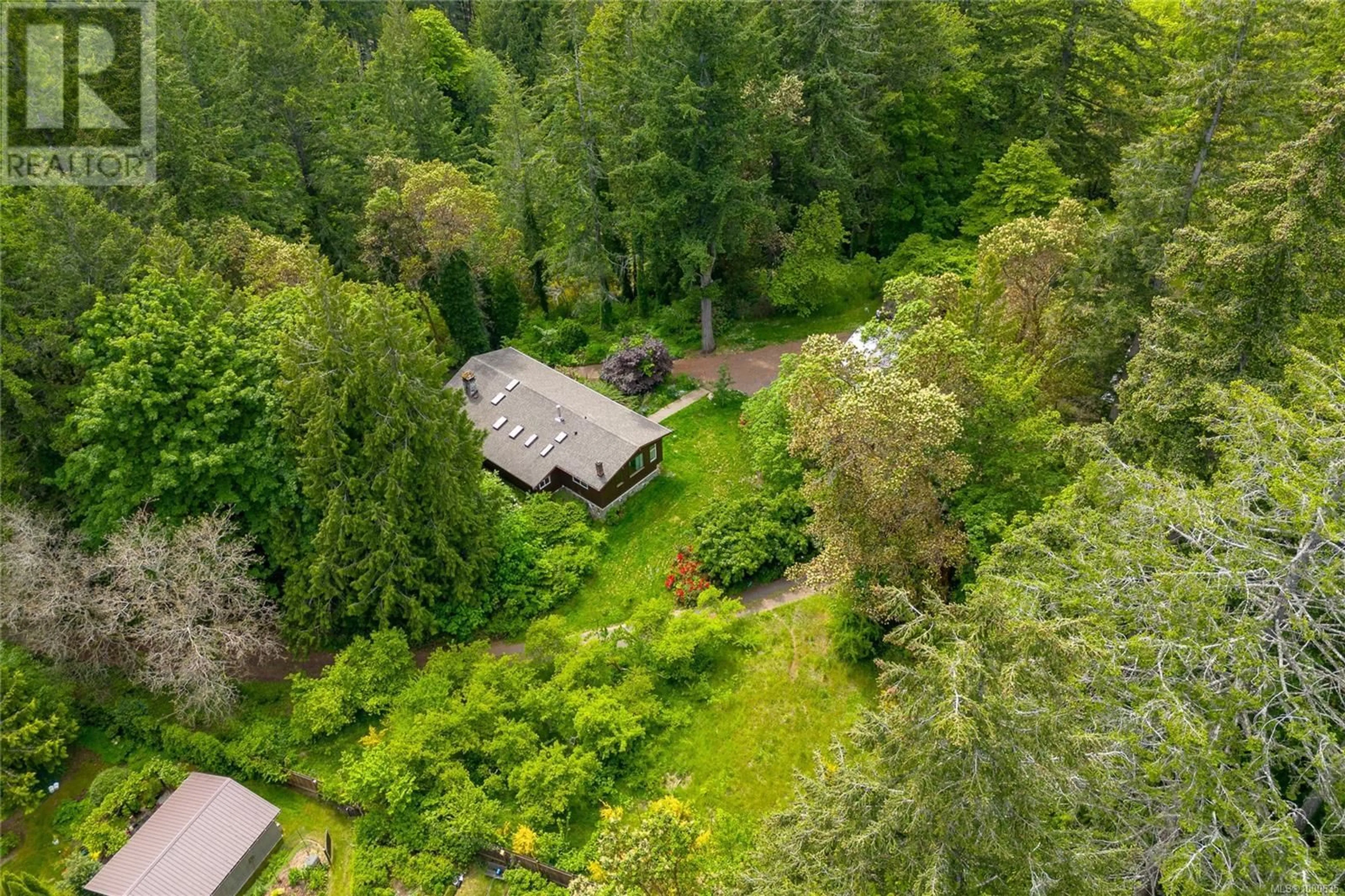 A pic from outside/outdoor area/front of a property/back of a property/a pic from drone, forest/trees view for 456 SPARTON ROAD, Saanich British Columbia V9E2H4