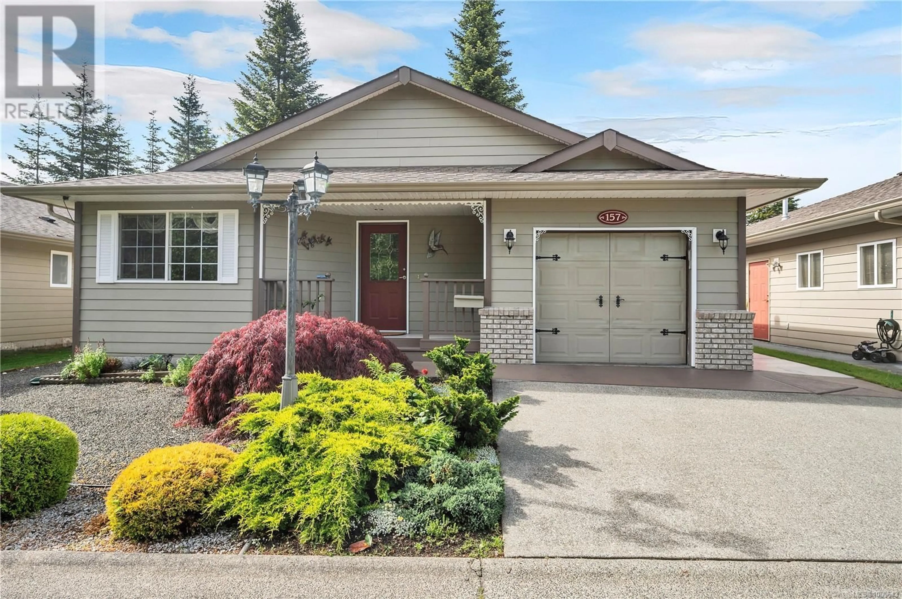Home with vinyl exterior material, street for 157 CHERRY TREE LANE, Campbell River British Columbia V9W8E9