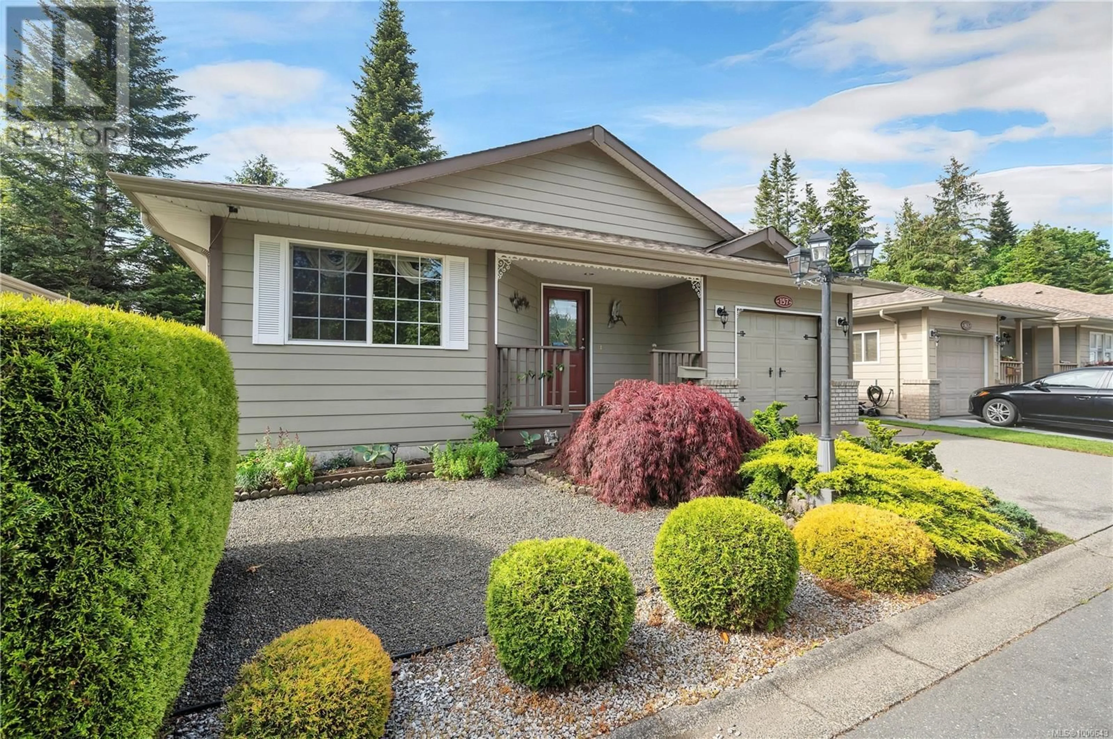 Home with vinyl exterior material, street for 157 CHERRY TREE LANE, Campbell River British Columbia V9W8E9