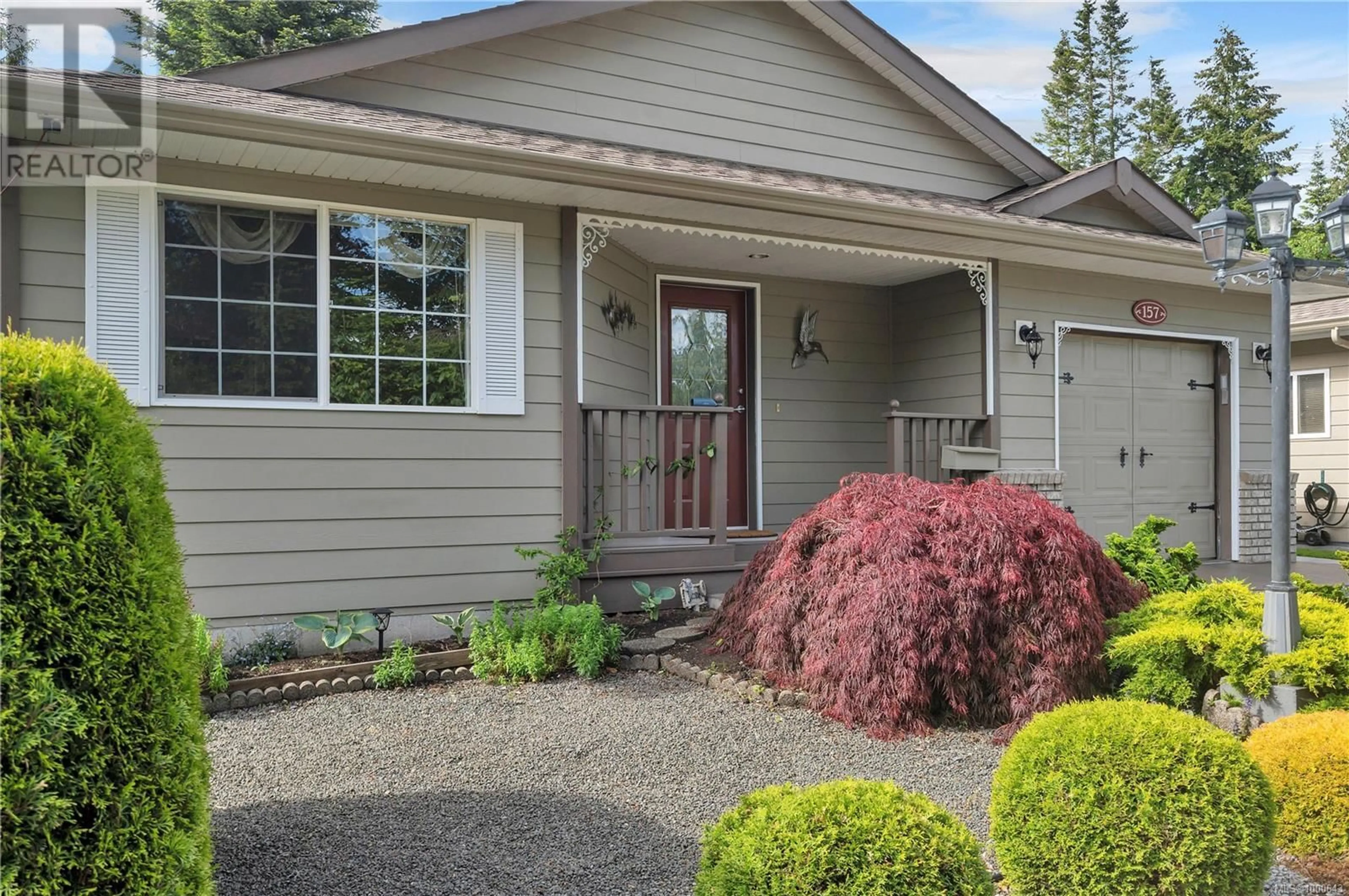 Home with vinyl exterior material, street for 157 CHERRY TREE LANE, Campbell River British Columbia V9W8E9