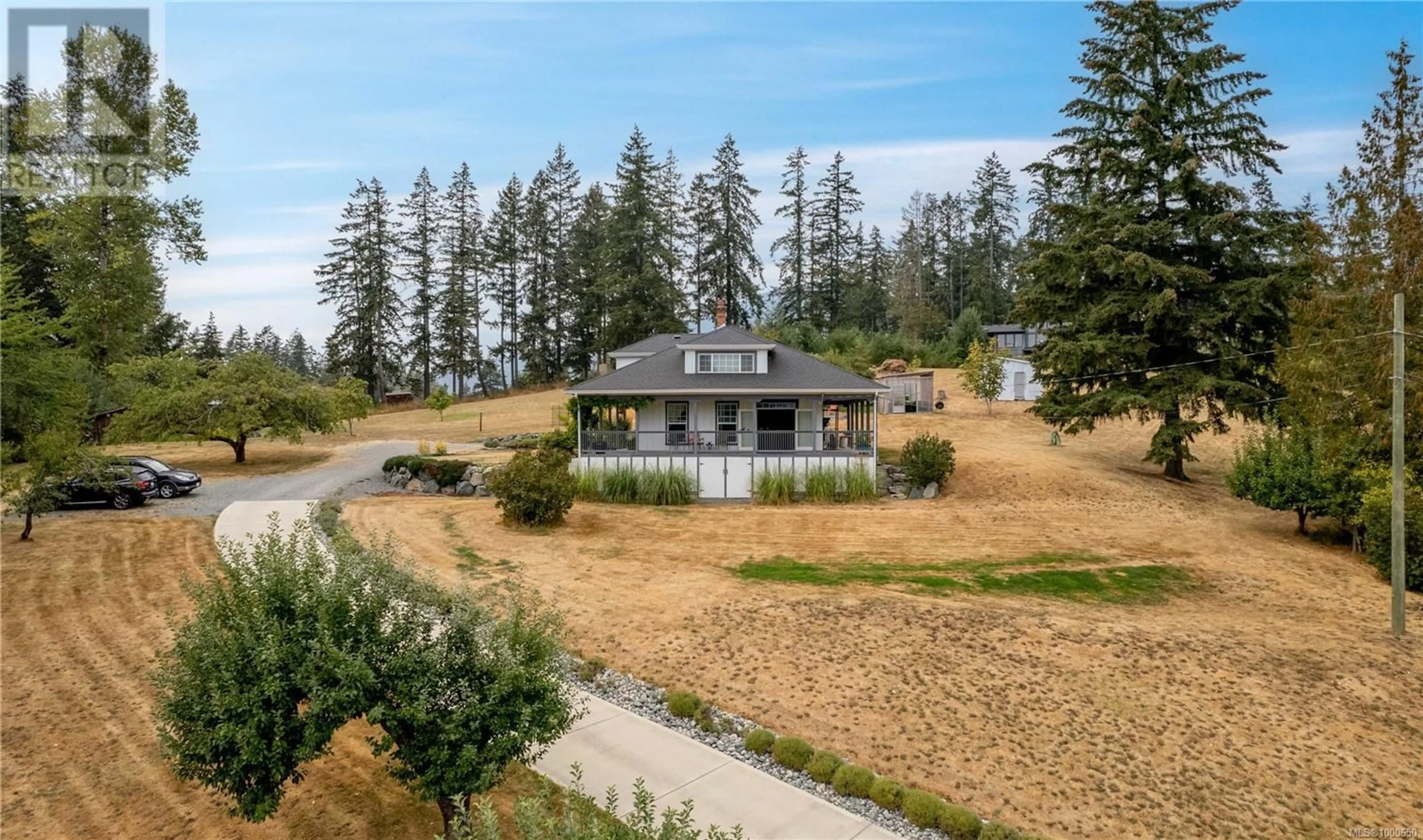 A pic from outside/outdoor area/front of a property/back of a property/a pic from drone, mountain view for 6742 NORCROSS ROAD, Duncan British Columbia V9L6C3