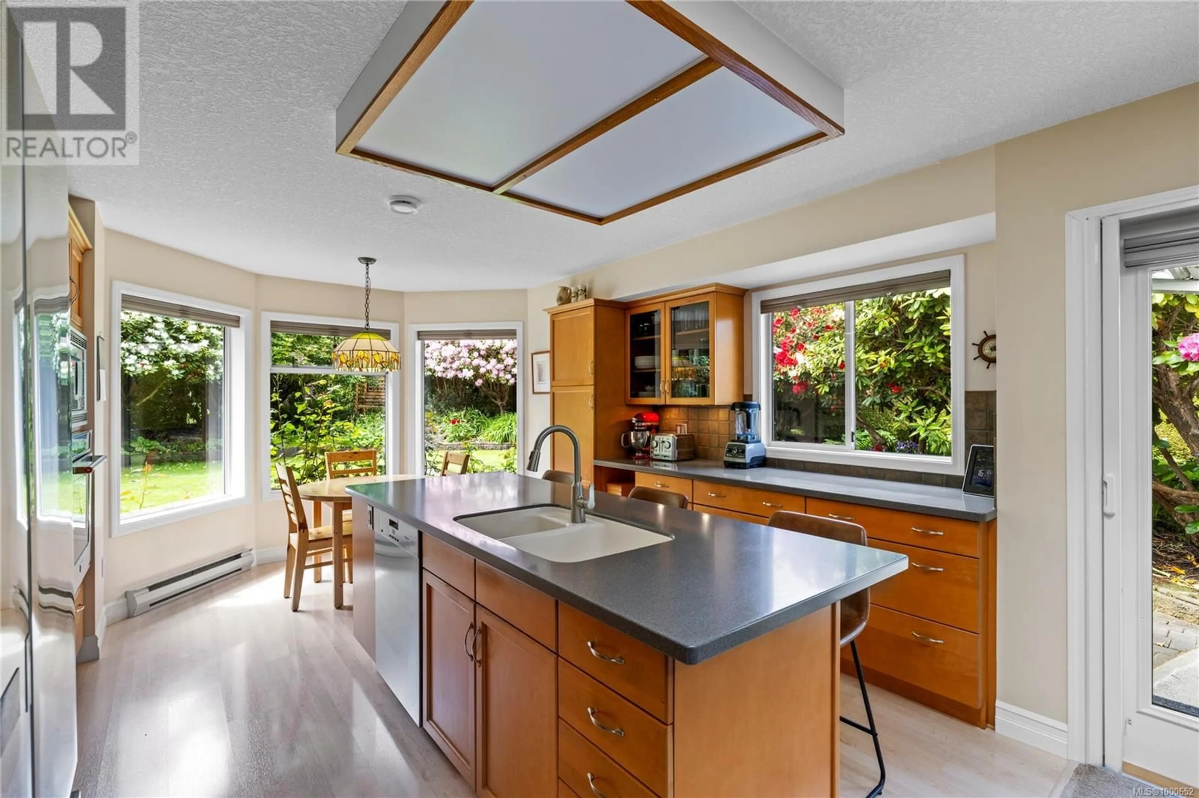 Open concept kitchen, ceramic/tile floor for 1147 WEDGEWOOD CLOSE, Qualicum Beach British Columbia V9K1C6