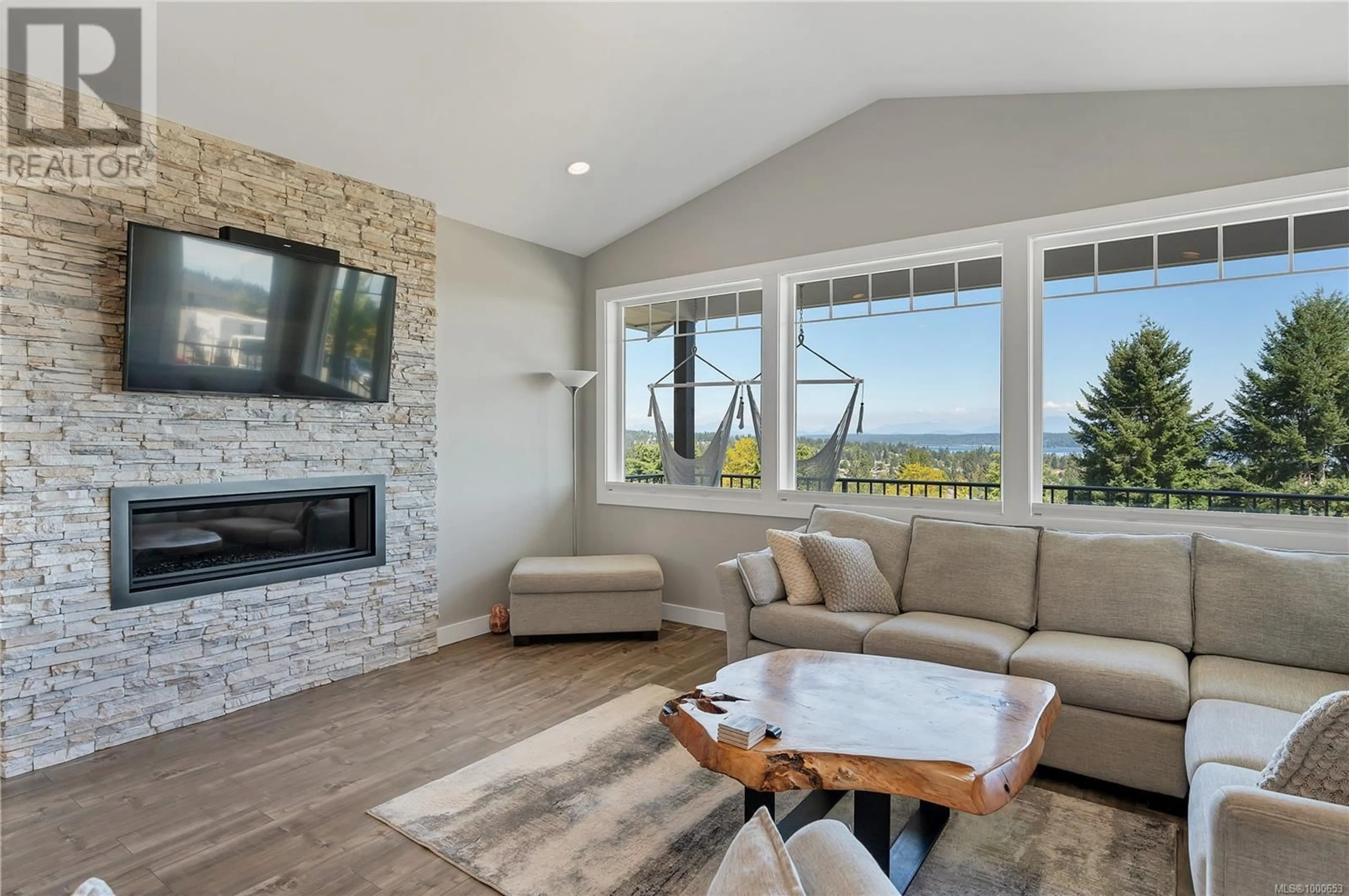 Living room with furniture, ceramic/tile floor for 721 TIMBERLINE DRIVE, Campbell River British Columbia V9H0A3