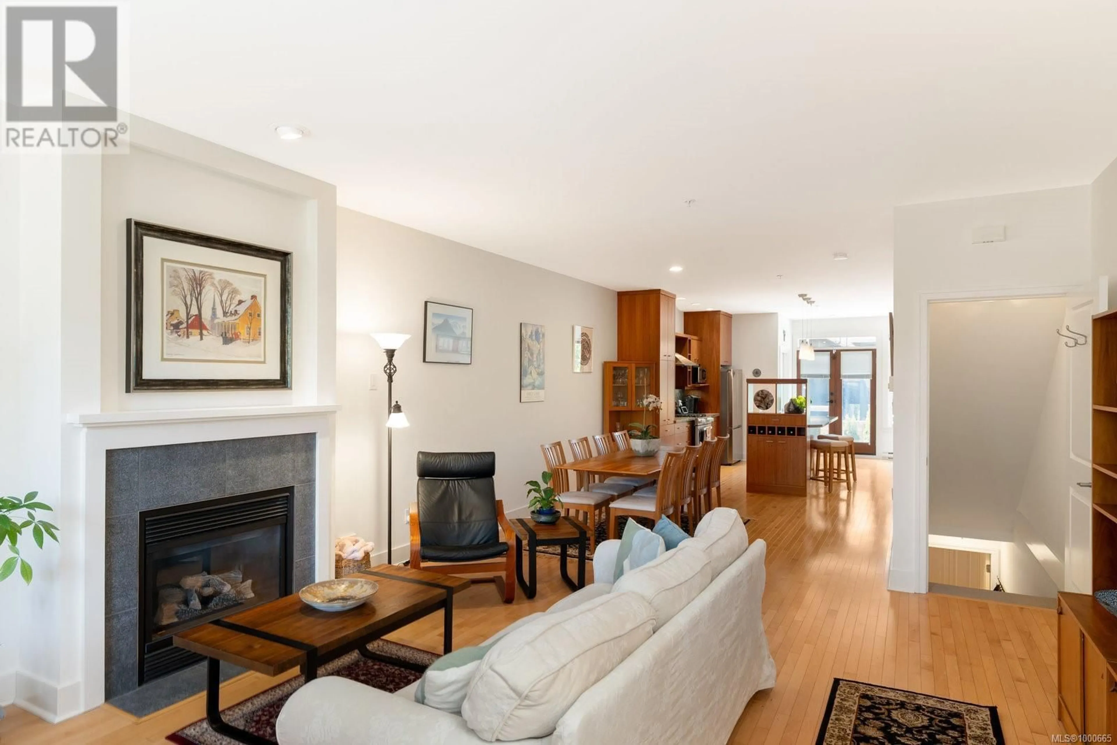 Living room with furniture, wood/laminate floor for 1524 YALE STREET, Oak Bay British Columbia V8R5N4