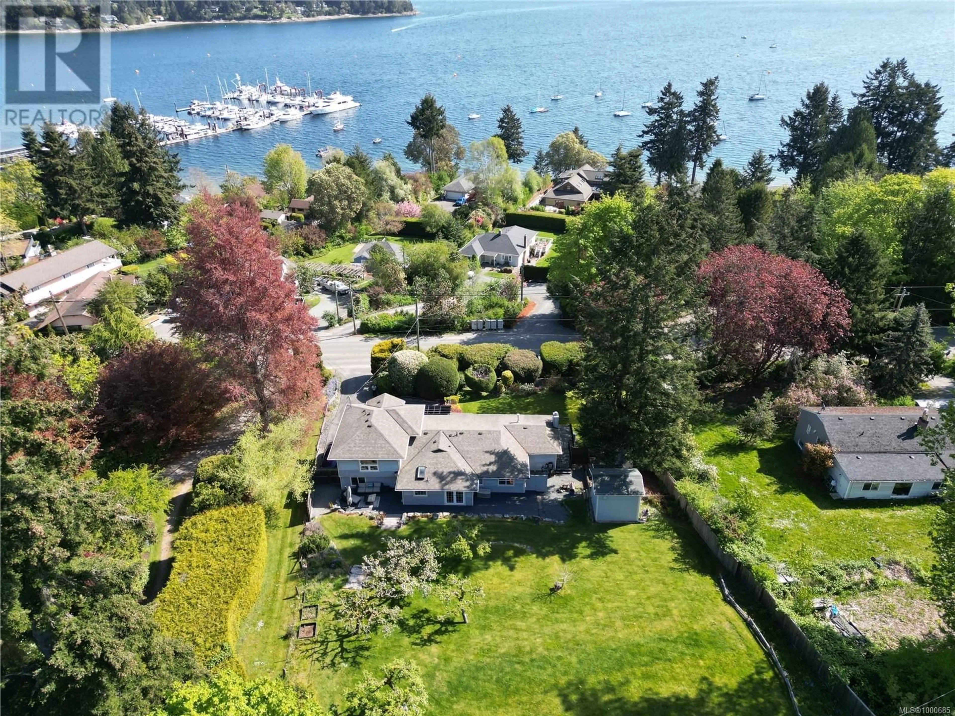 A pic from outside/outdoor area/front of a property/back of a property/a pic from drone, water/lake/river/ocean view for 2618 MILL BAY ROAD, Mill Bay British Columbia V8H1C9