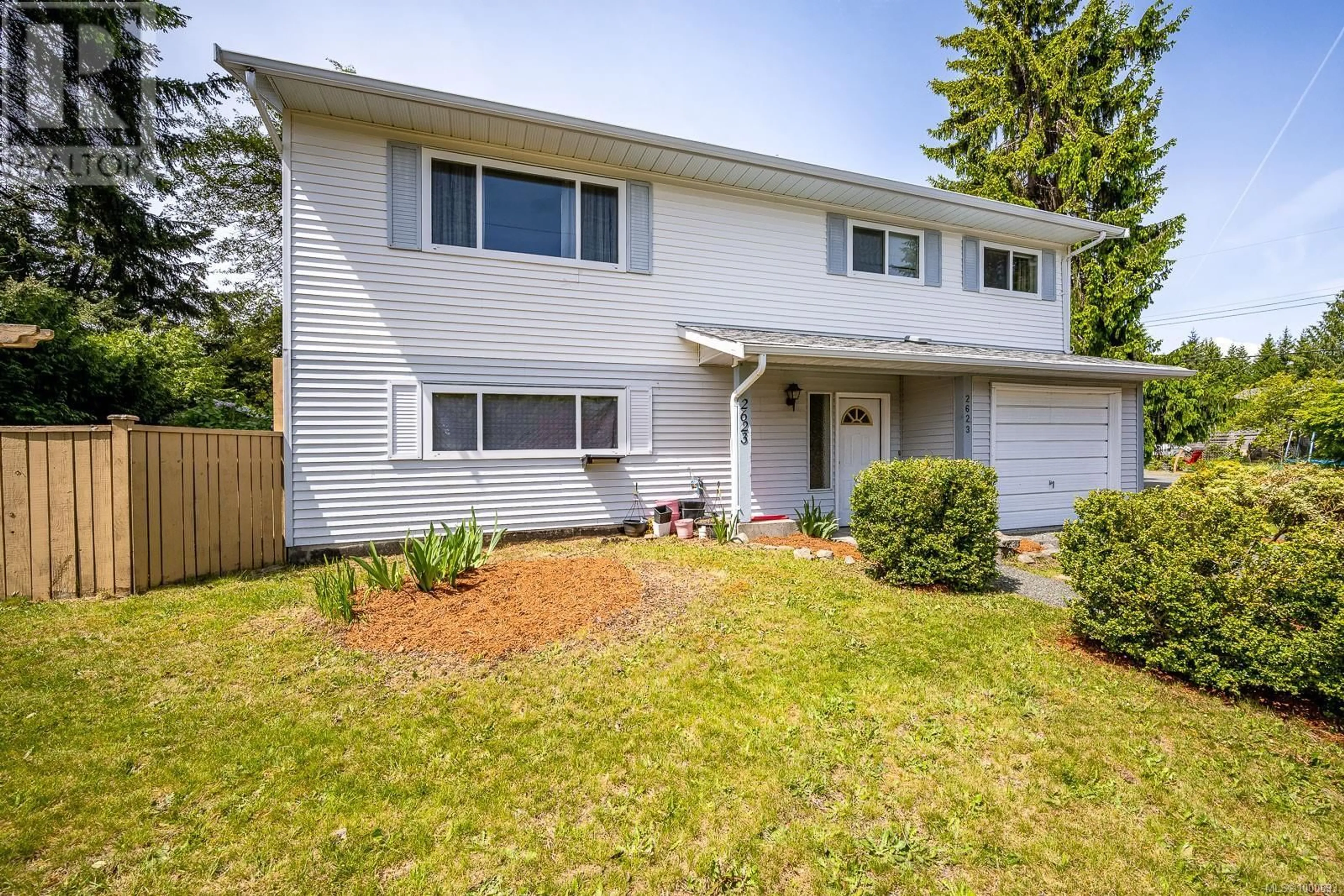 Home with vinyl exterior material, street for 2623 ULVERSTON AVENUE, Cumberland British Columbia V0R1S0