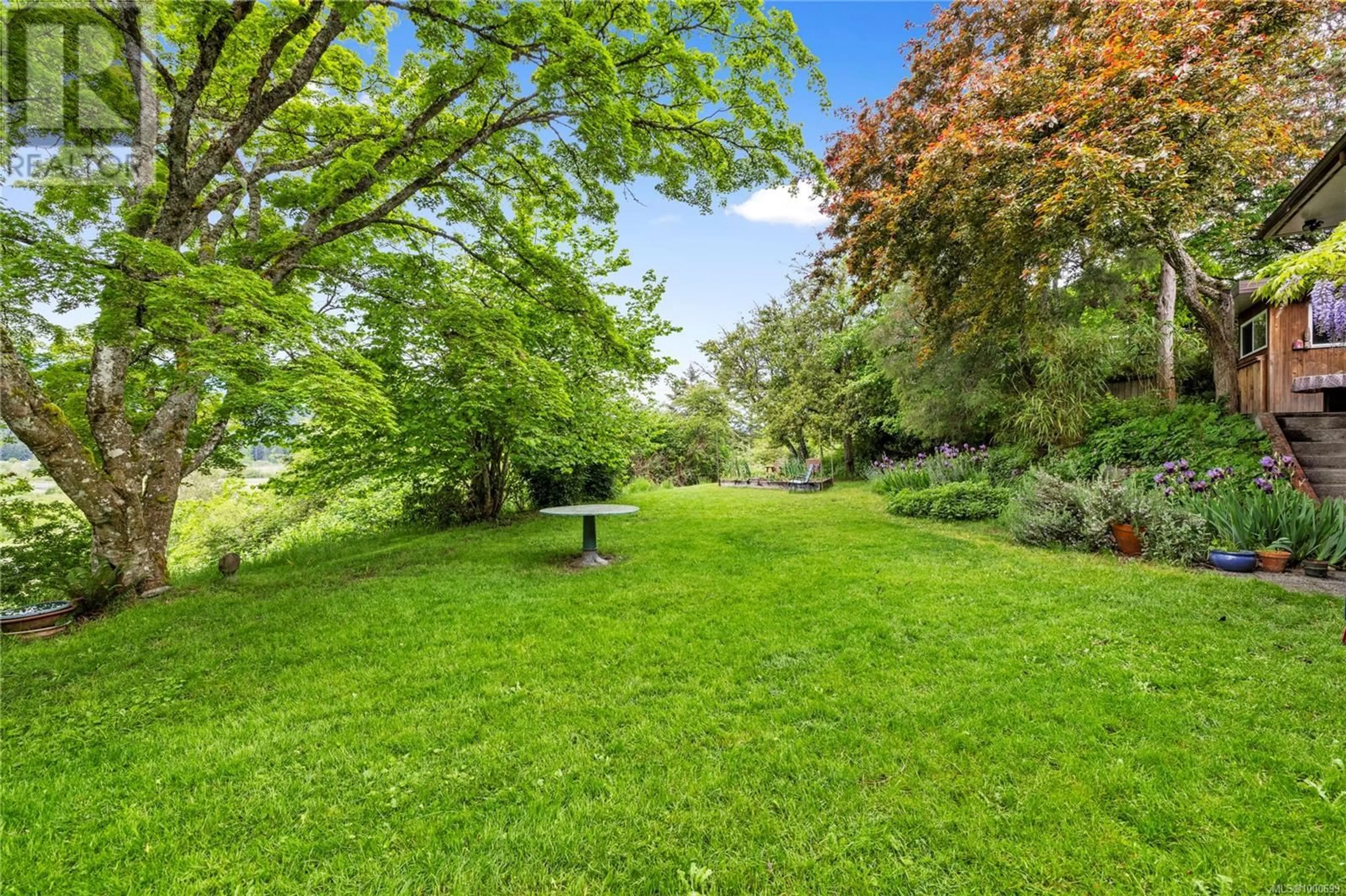 A pic from outside/outdoor area/front of a property/back of a property/a pic from drone, forest/trees view for 221 GARNER CRESCENT, Nanaimo British Columbia V9R2A5