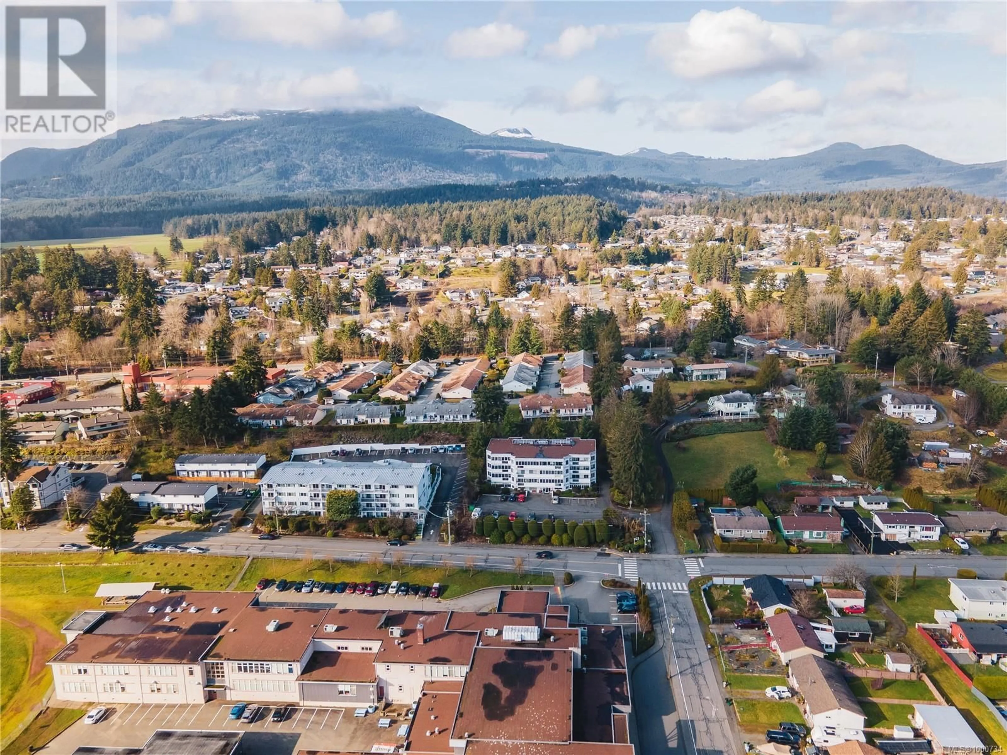 A pic from outside/outdoor area/front of a property/back of a property/a pic from drone, mountain view for 203 - 9958 DANIEL STREET, Chemainus British Columbia V0R1K1