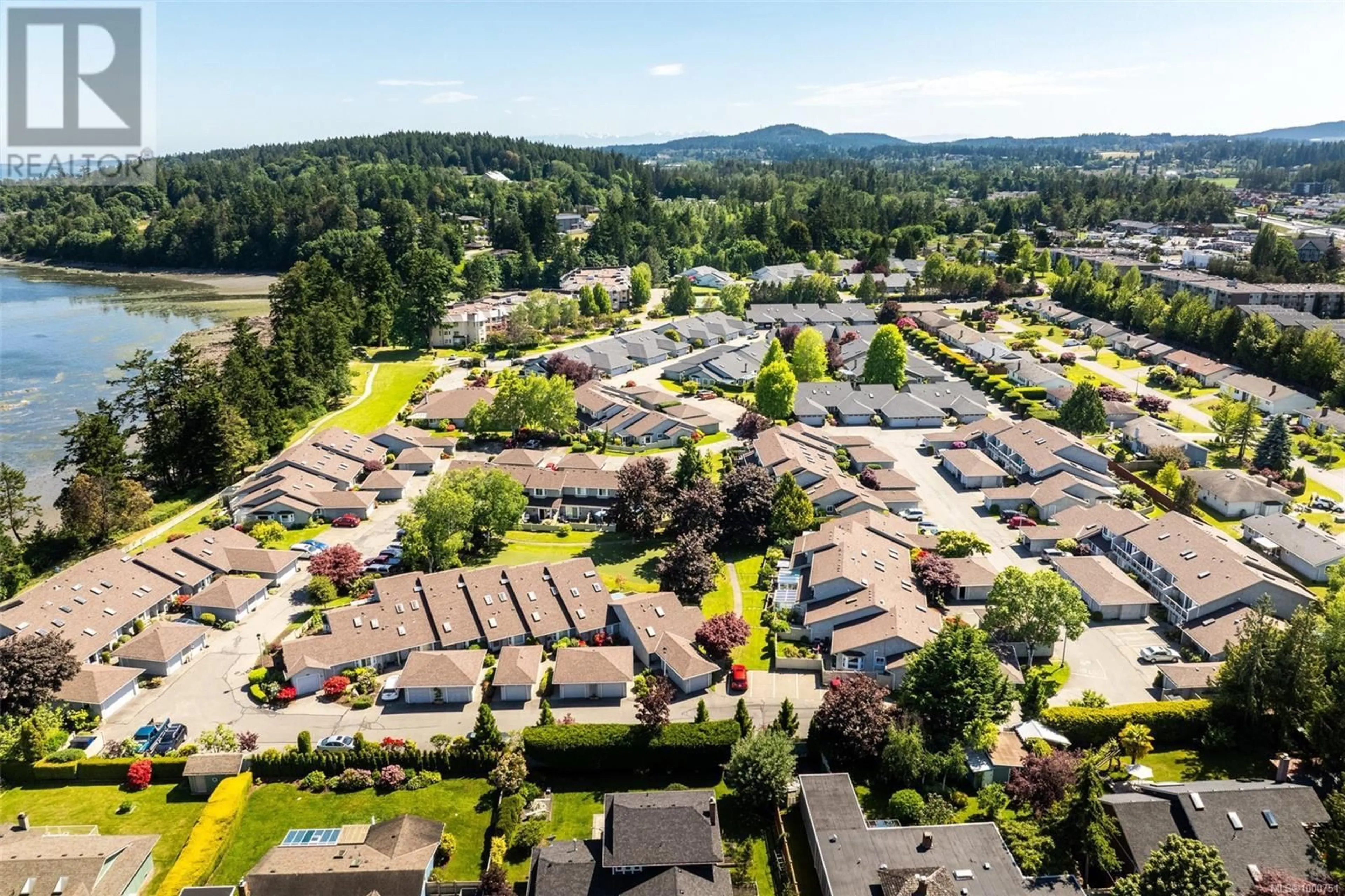 A pic from outside/outdoor area/front of a property/back of a property/a pic from drone, mountain view for 102 - 2600 FERGUSON ROAD, Central Saanich British Columbia V8M2C1