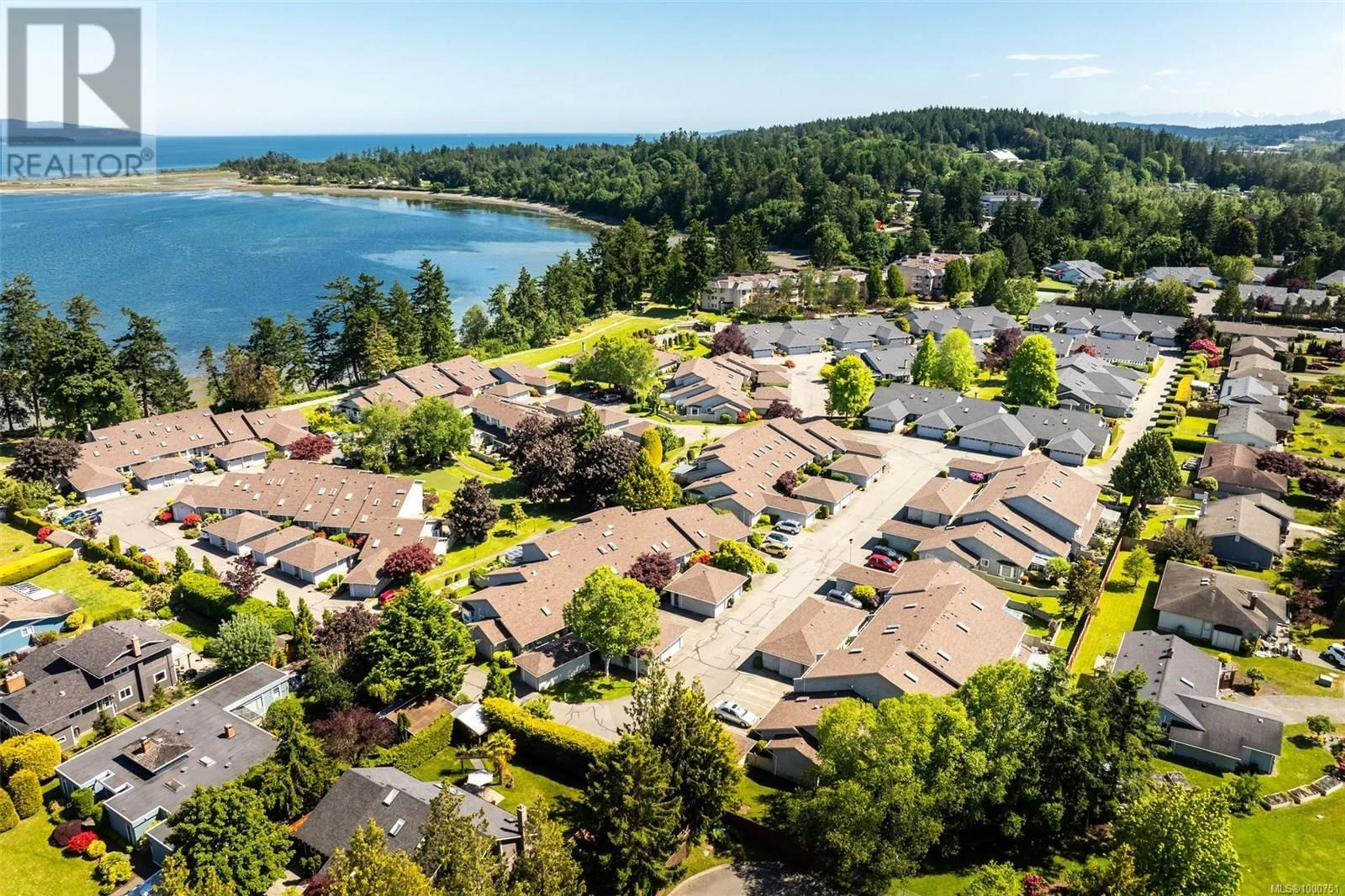 A pic from outside/outdoor area/front of a property/back of a property/a pic from drone, water/lake/river/ocean view for 102 - 2600 FERGUSON ROAD, Central Saanich British Columbia V8M2C1