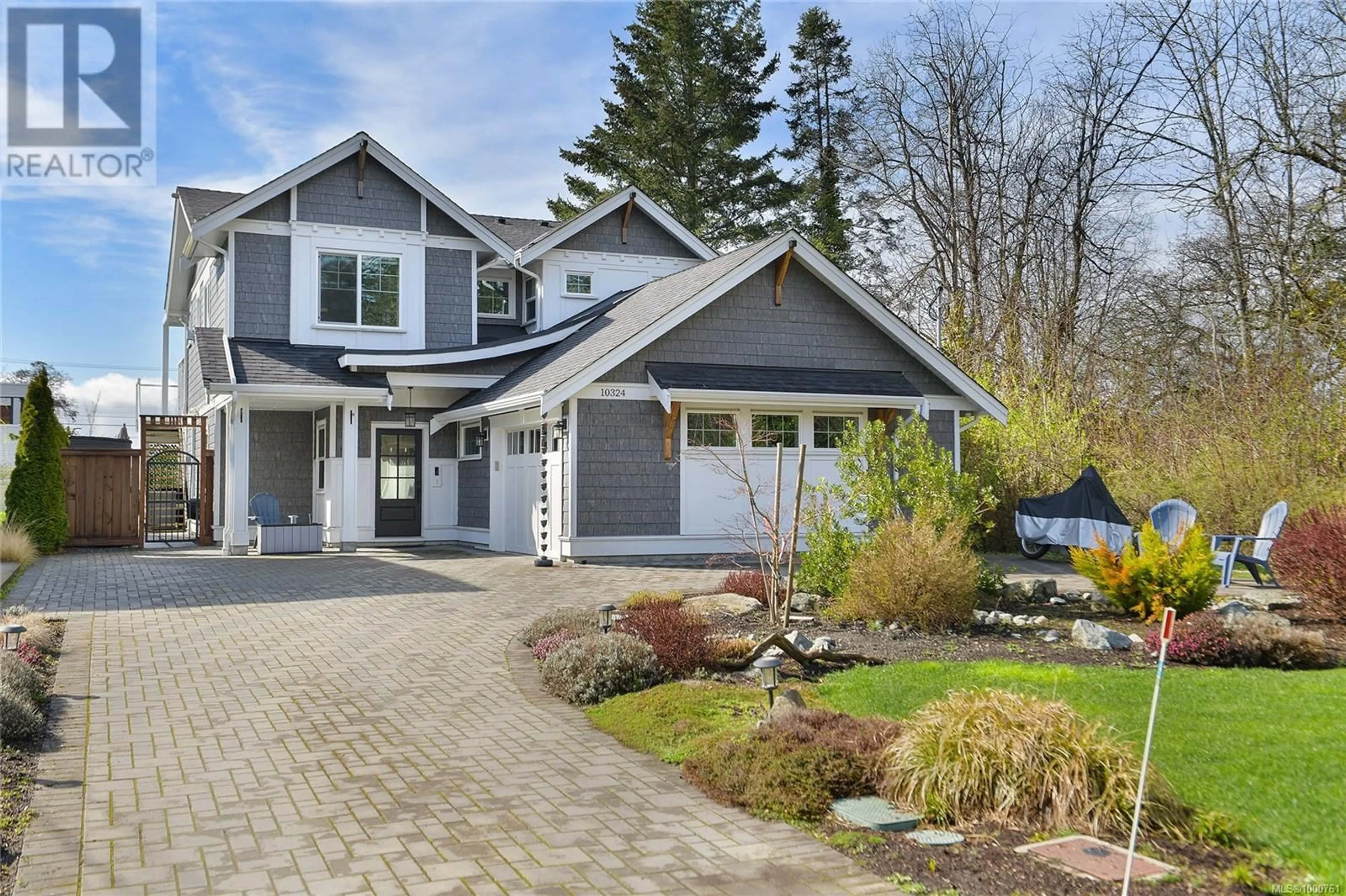Home with vinyl exterior material, street for 10324 TSAYKUM ROAD, North Saanich British Columbia V8L0A2