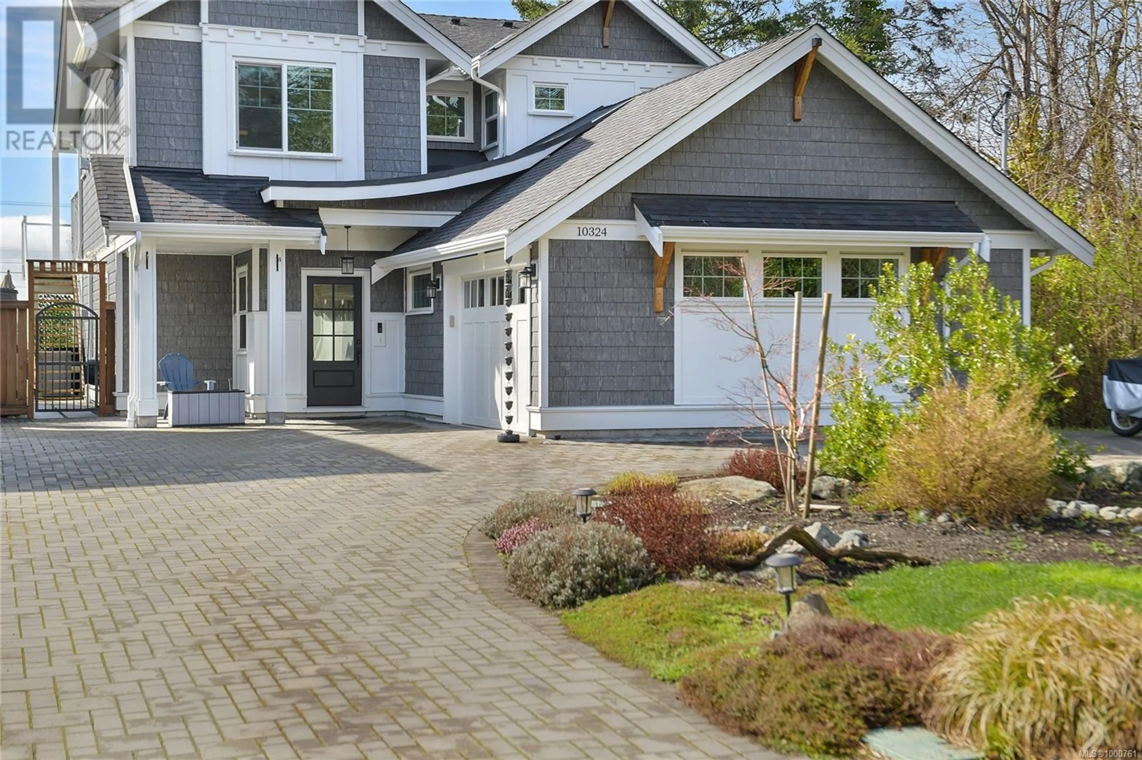 Home with brick exterior material, street for 10324 TSAYKUM ROAD, North Saanich British Columbia V8L0A2